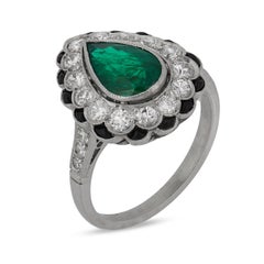 Art Deco inspired 1.56 carat pear shape emerald diamond platinum onyx ring