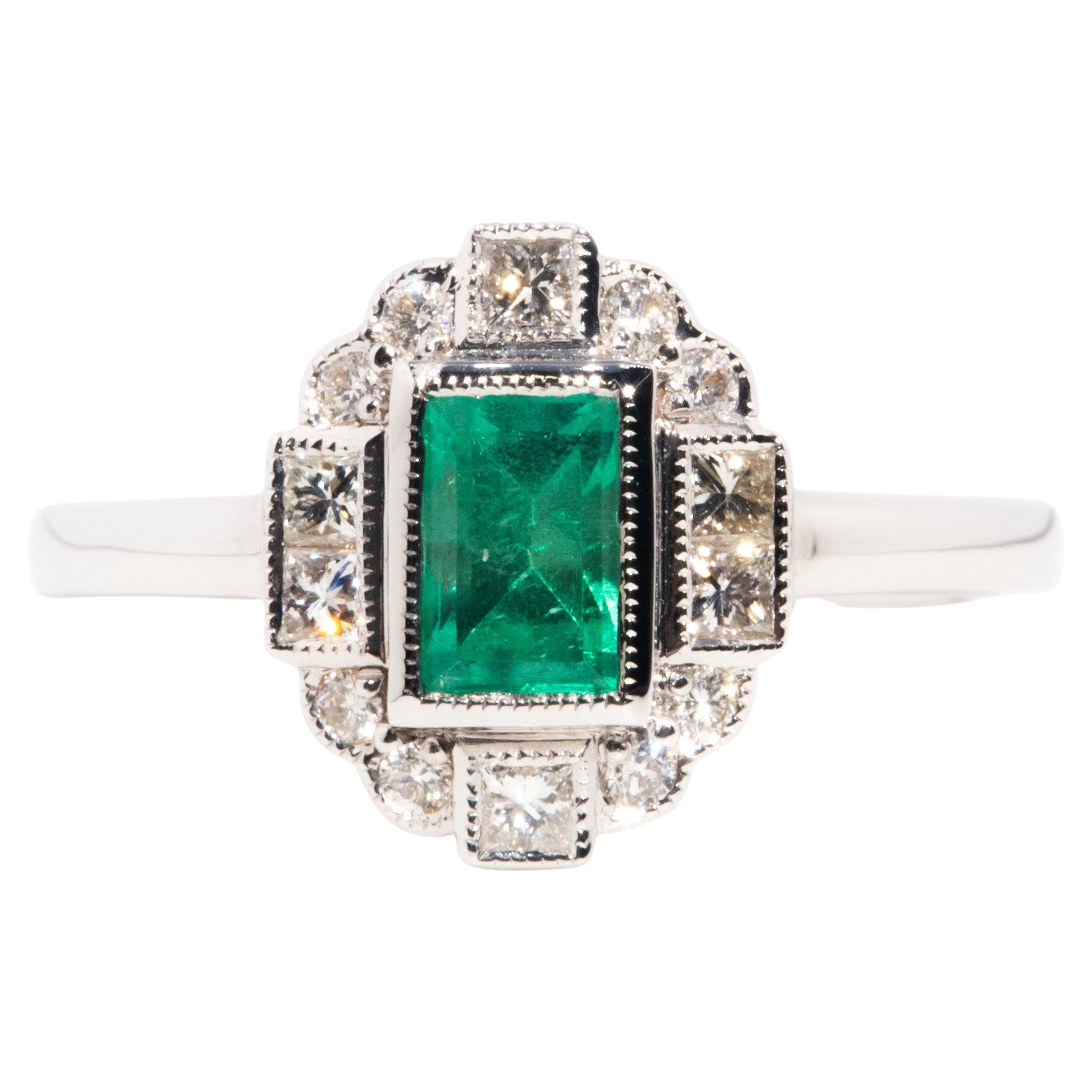 Art Deco Inspired 18 Carat Gold Emerald Cut Emerald and Diamond Cluster Ring