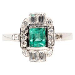 Art Deco Inspired 18 Carat White Gold Carre Cut Emerald and Diamond Cluster Ring