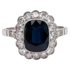 Art Deco Inspired 3.11 Carat Sapphire and Diamond Platinum Cluster Ring