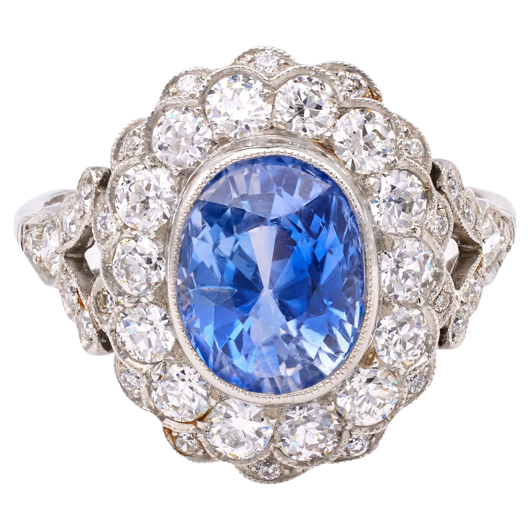 Art Deco Inspired 3.94 Carat Sapphire and Diamond Platinum Cluster Ring For Sale