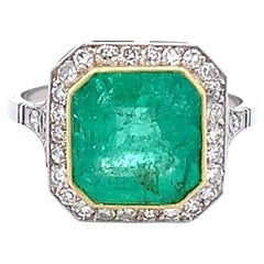 Art Deco Inspired 4.27 Carats Emerald Diamond Platinum Halo Ring