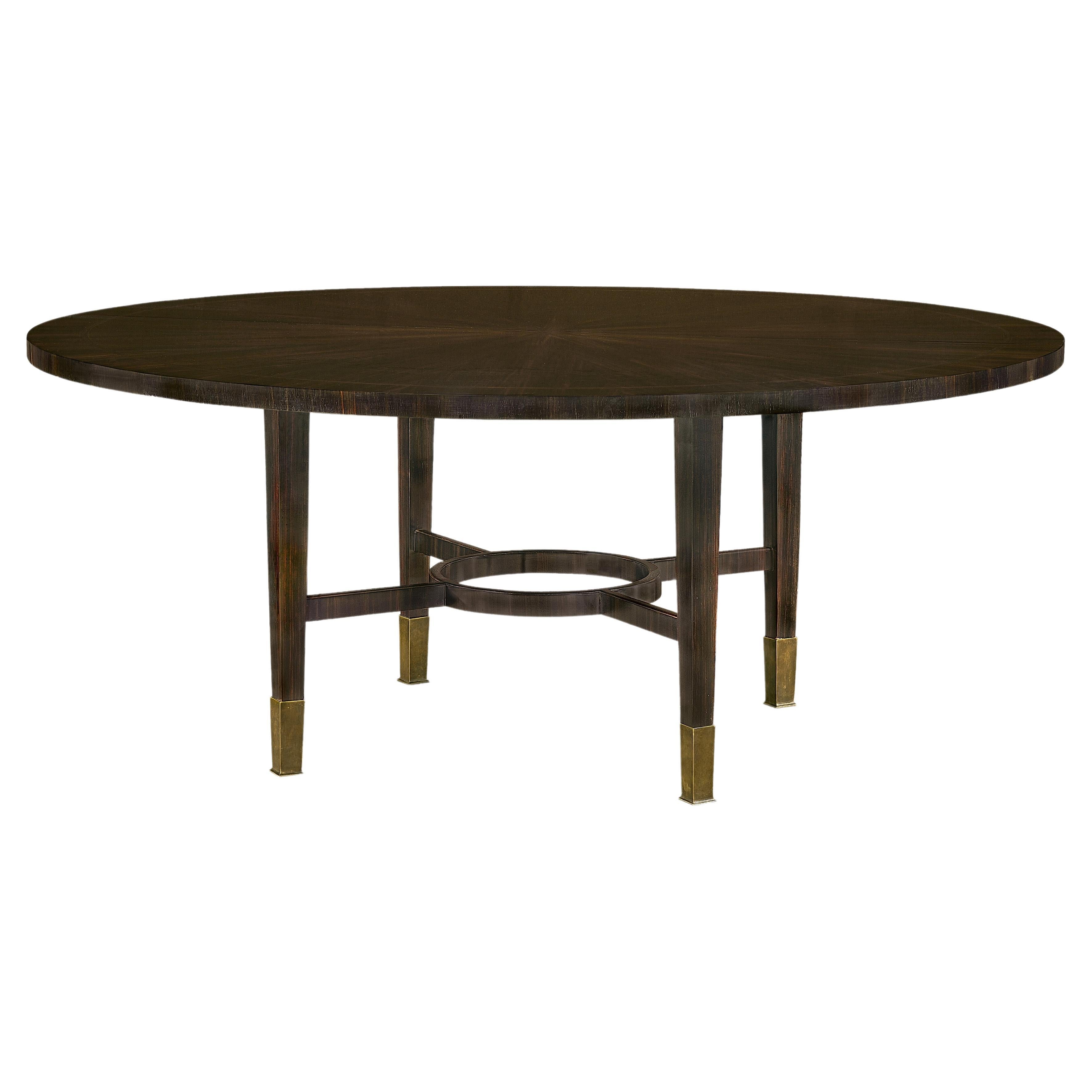 Art Deco inspired Argueil dining table with ebony veneers & legs with brass caps