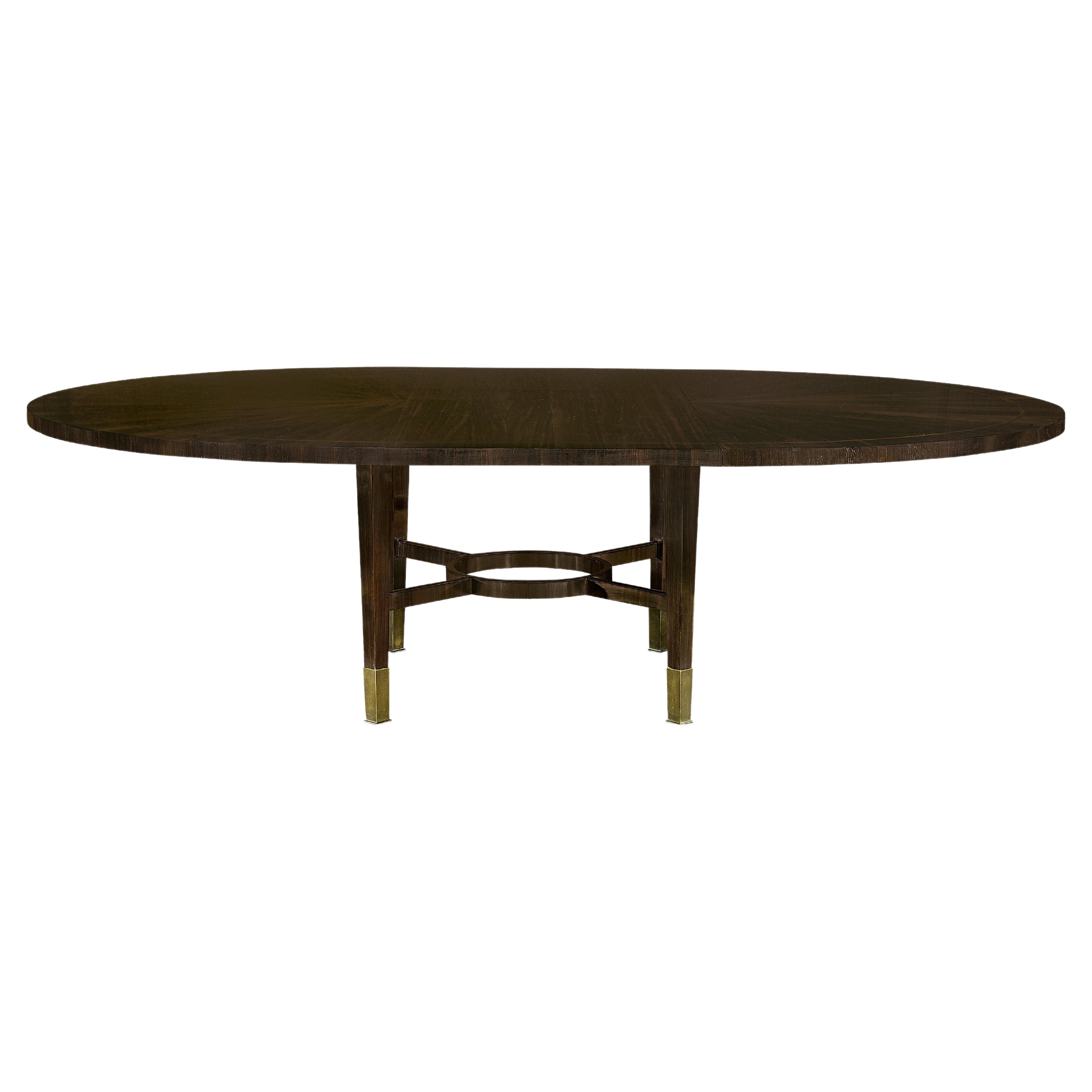 Art Deco inspired Argueil dining table with ebony veneers & legs with brass caps