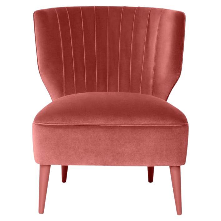 Fauteuil d'inspiration Art Déco avec détails de couture sur le dossier