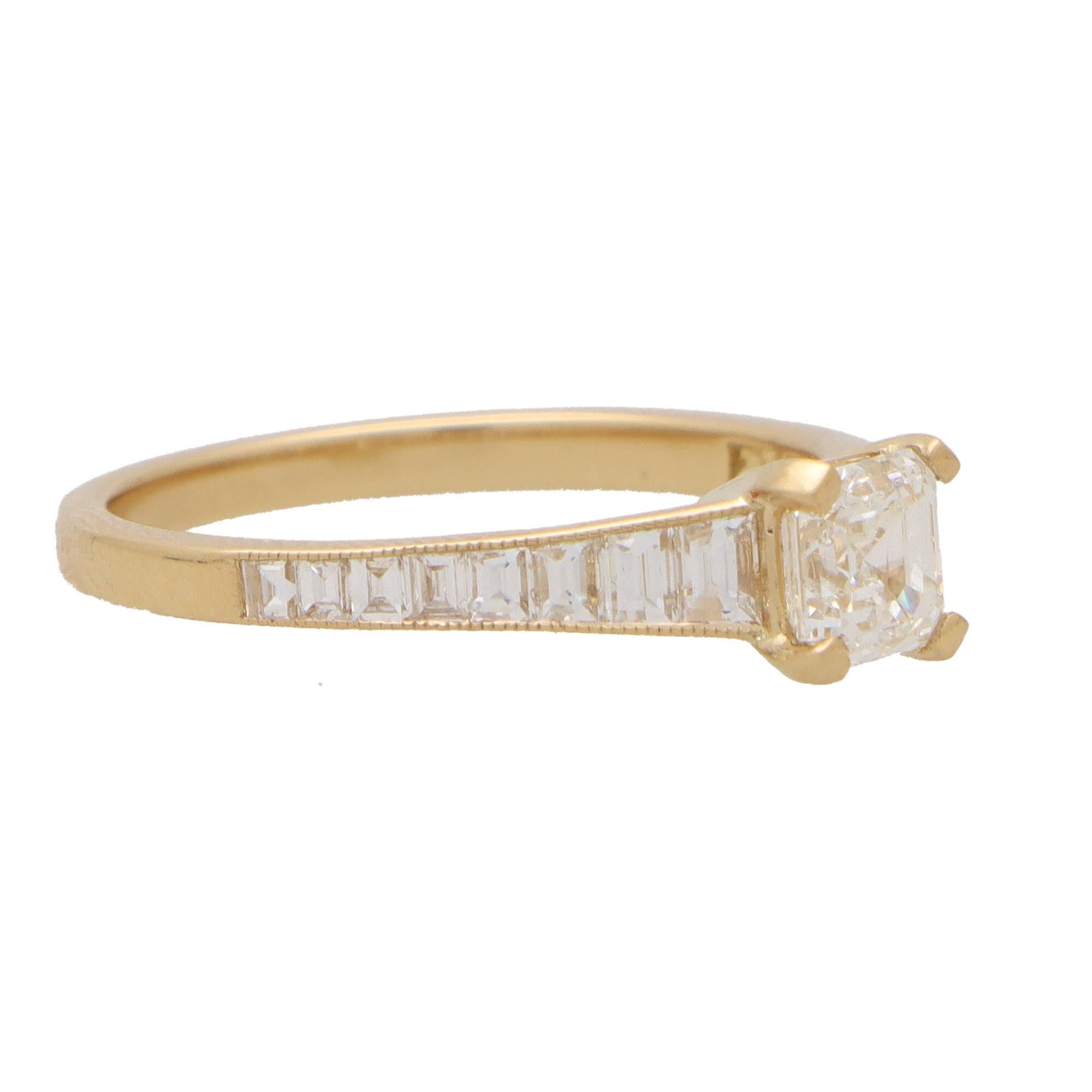  A beautiful Art Deco inspired Asscher cut diamond ring set in 18k yellow gold. 

This sparkly piece is centrally set with an extremely elegant independently GIA certified Asscher cut diamond. The diamond is securely four claw set to centre and is