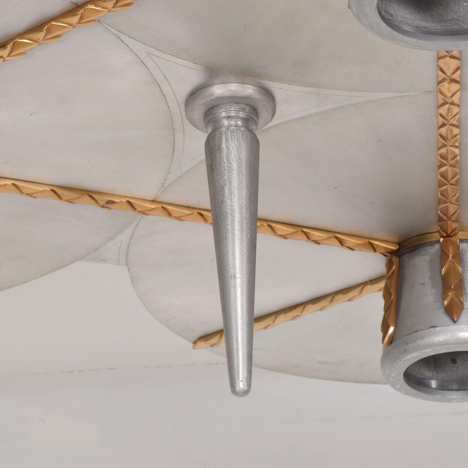 For your consideration a ceiling light fixture constructed of aluminum and bronze. 

Fixture requires to be mounted into the ceiling with six screws (not included).

Beautiful well balanced design of three circles. The perfect trinity.