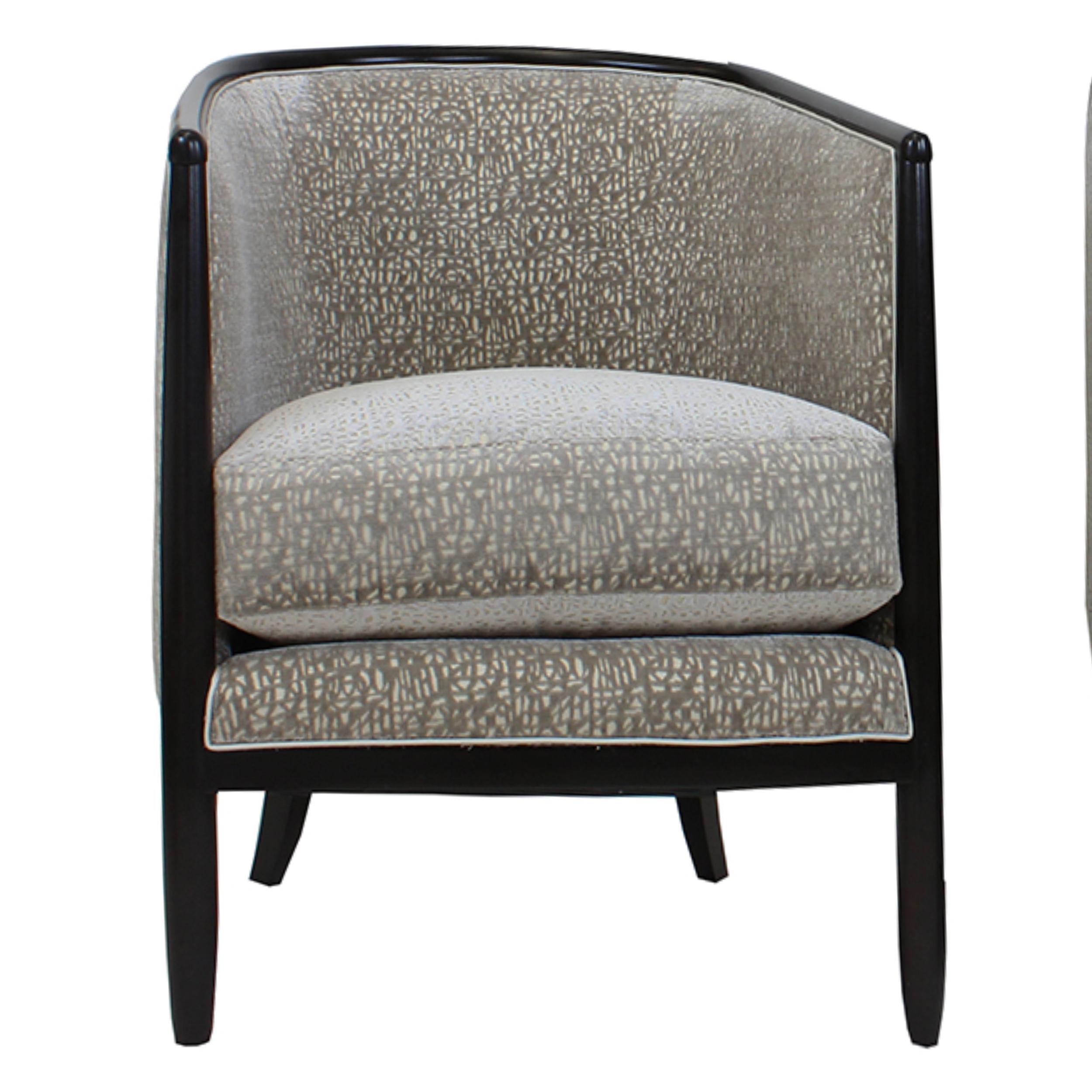 Art Deco inspired chair is made from African mahogany wood and upholstered in a soft cut velvet. Tight back barrel shape makes for a cozy chair that is luxurious and chic. Loose seat cushion is a comfortable feather/down wrapped foam and sits atop a