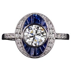 Art déco-inspirierter Ring mit Diamanten und blauem Saphir