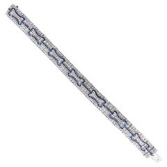 Art déco-inspiriertes Glieder-Tennisarmband mit Diamanten und Saphiren