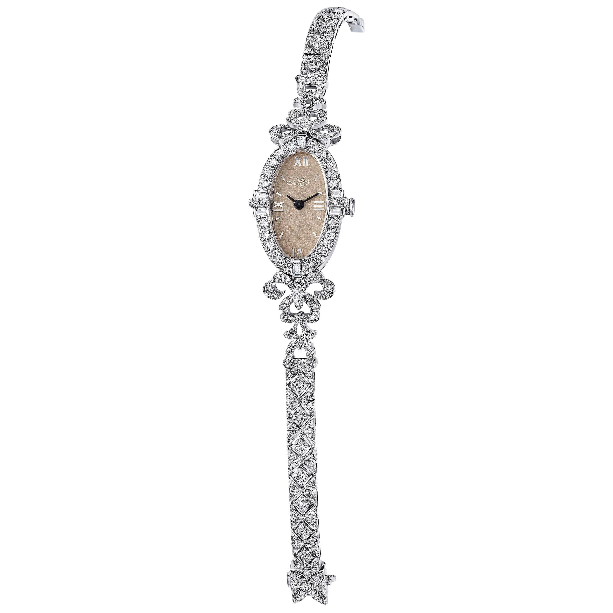 Inspired by the Art Deco movement, Dilys’ exceptional Swiss quartz movement diamond watch in 18 karat gold exhibits beautiful intricacy with detailed cutouts and outlines throughout. This timepiece speaks for itself and is a work of wearable art.