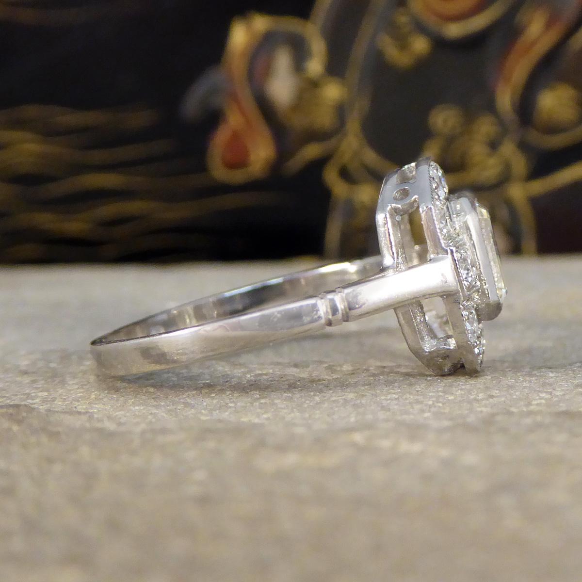 Art Deco Inspired Emerald Cut Diamond Cluster Ring in Platinum In Excellent Condition For Sale In Yorkshire, West Yorkshire
