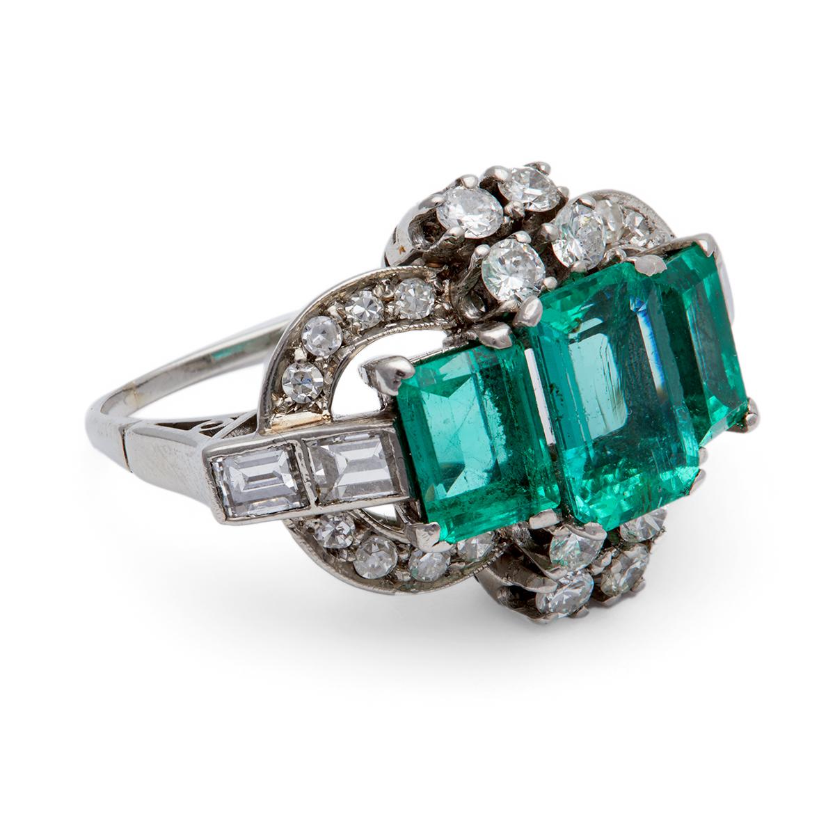 Women's or Men's Art Deco Inspired Emerald Diamond Platinum Cocktail Ring For Sale