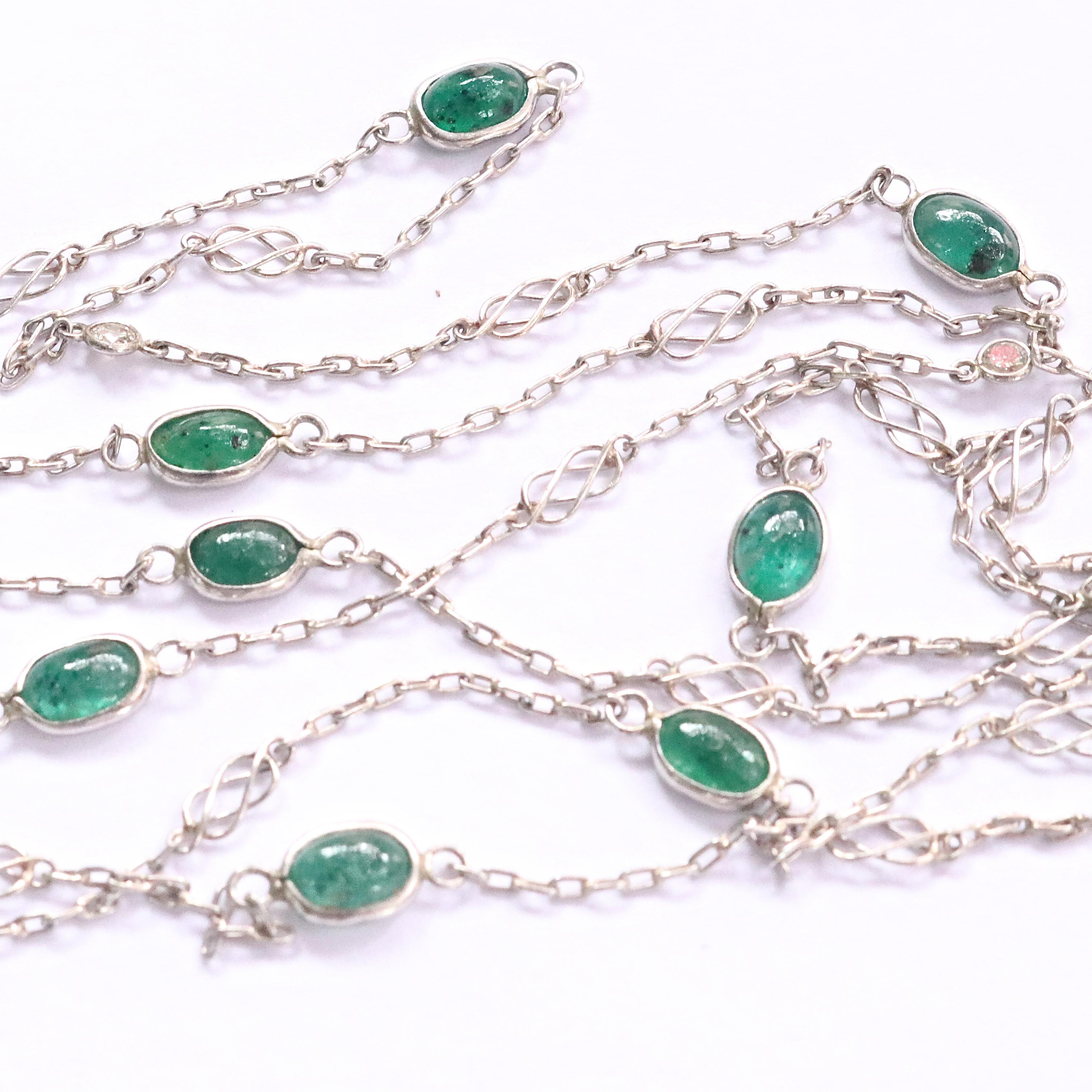 Art deco inspired emerald & diamond platinum necklace. Featuring 10 oval emerald beads that weigh approximately 6 carats. With 9 round brilliant diamonds weighing approximately 0.45 carats, graded H-I color, SI clarity. Circa 2019. 39 inches long.