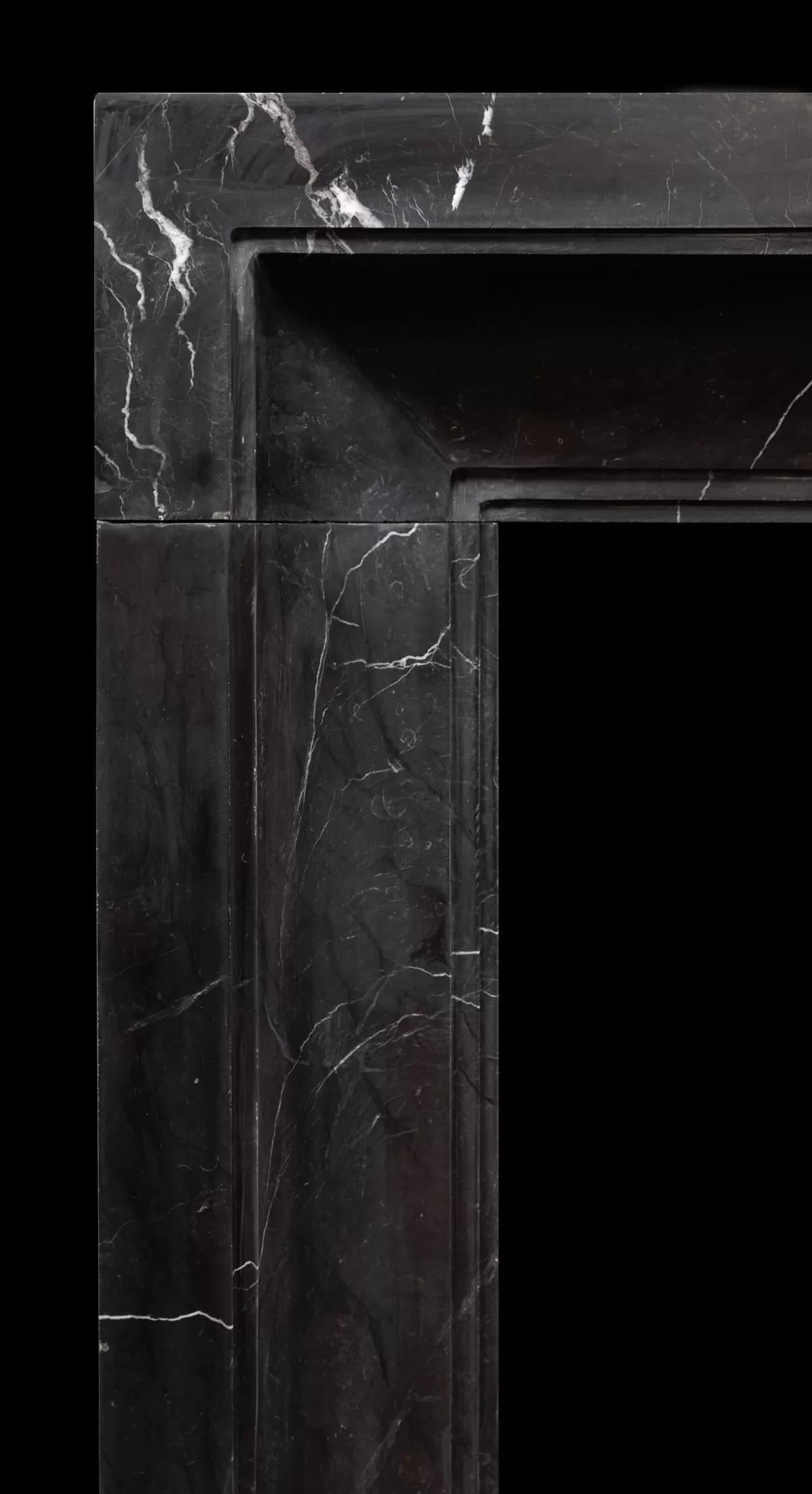Northern Irish Art Deco inspired fireplace made in black and white Nero Marquina marble For Sale