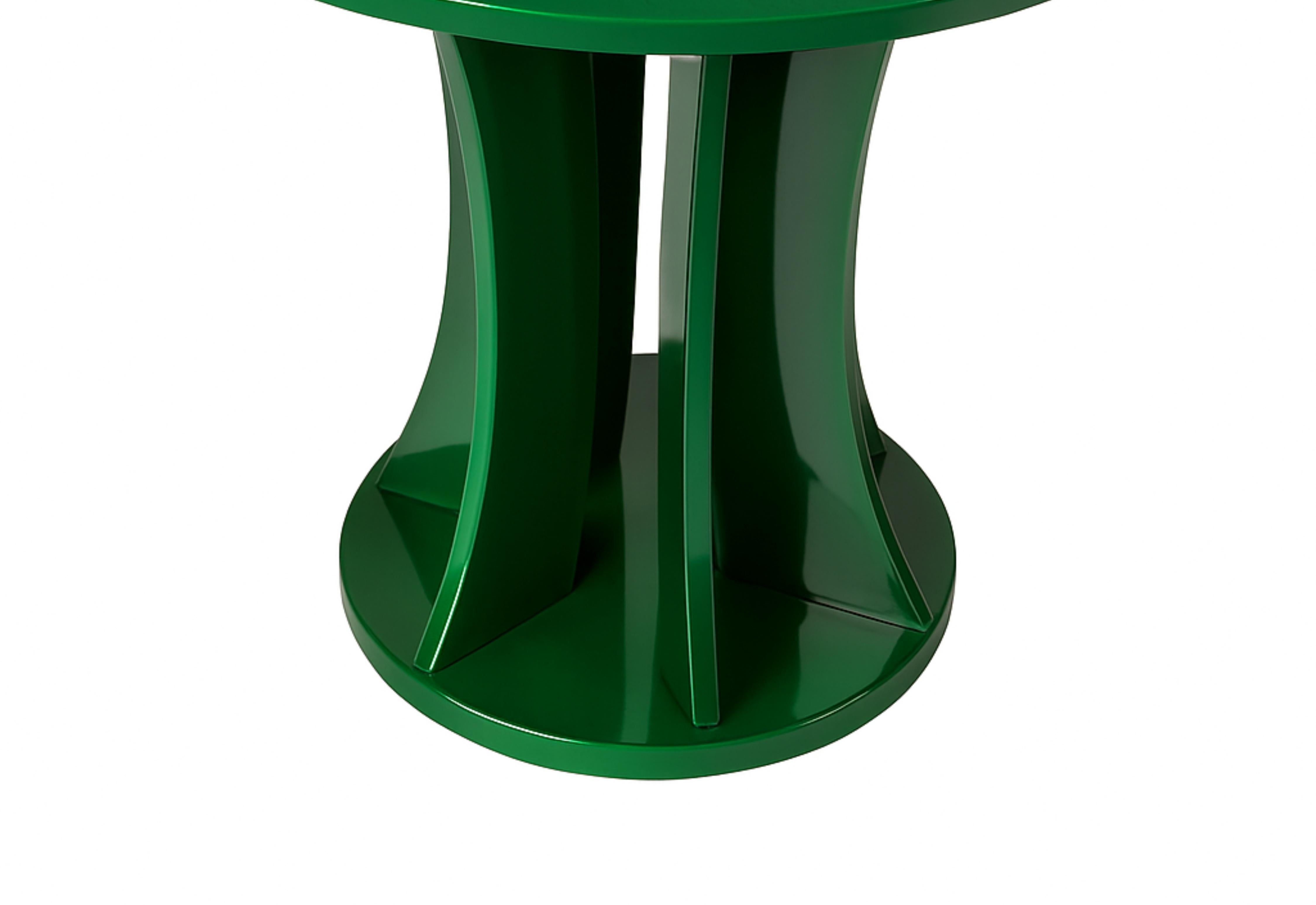A refined French Green Emerald (#CA6641 color reference) Art Deco inspired side table from the 20th century, finished in lustrous varnish and supported by gracefully rounded legs. Its bold geometric silhouette adds a touch of sophistication to any