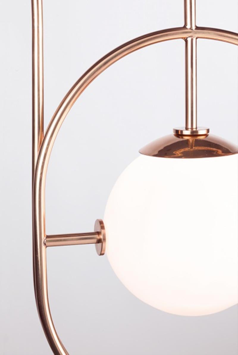 Loop I Pendant lamp evokes a sense of playfulness thanks to the juxtaposition of primary shapes. It can be used to create a modern yet timeless space and resembles a modern, elegant sculpture Art Deco inspired, producing a magical luminous