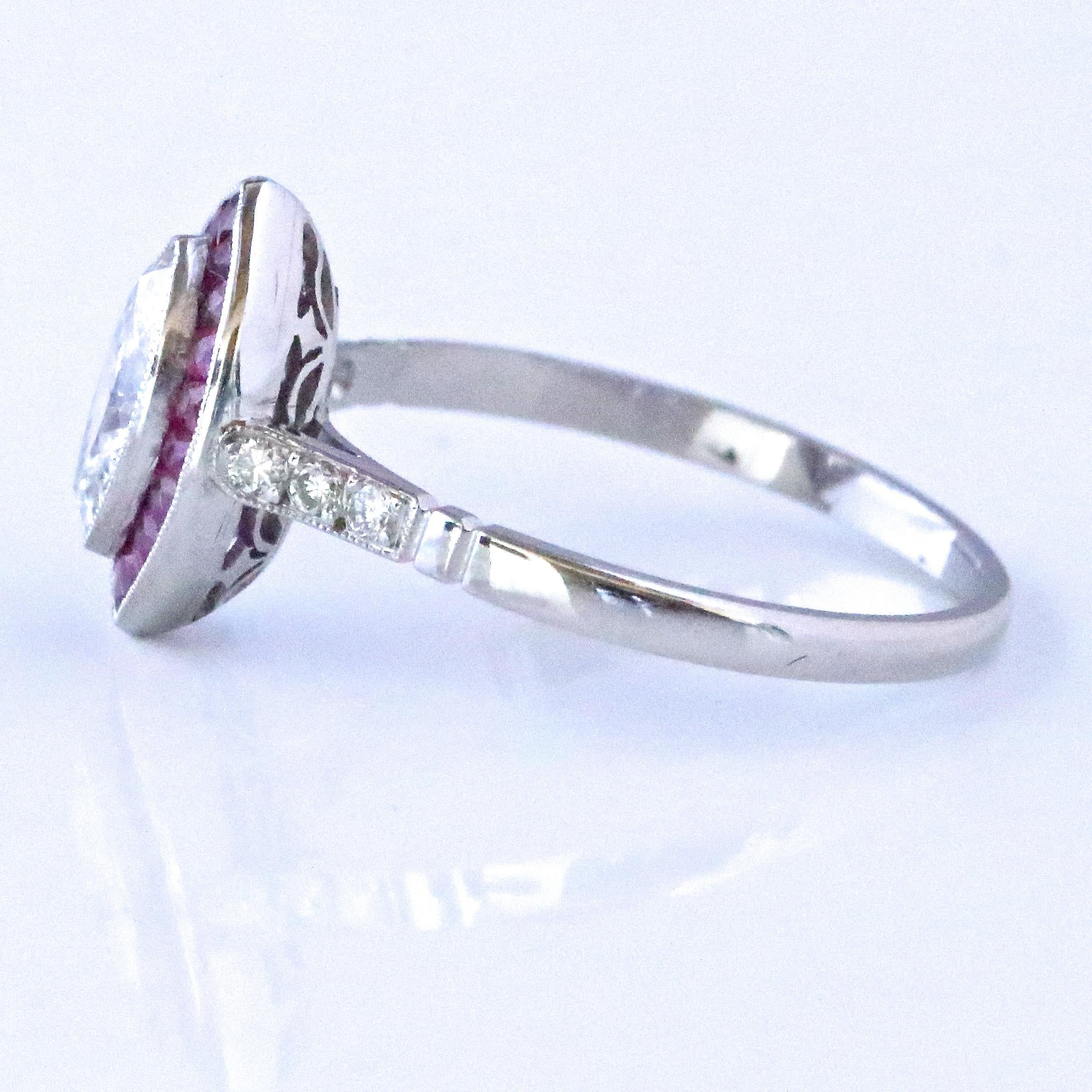 The Art Deco style never gets old! The dancing, the cocktails, the lifestyle, all the things the Roaring 20's are known for. Feel yourself like a 1920's fashionista wearing this gorgeous Art Deco Inspired Diamond Ruby Ring. The center stone is a