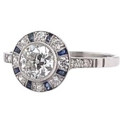 Art Deco inspirierter Halo-Ring aus Platin mit Diamanten im alteuropäischen Schliff und Saphiren