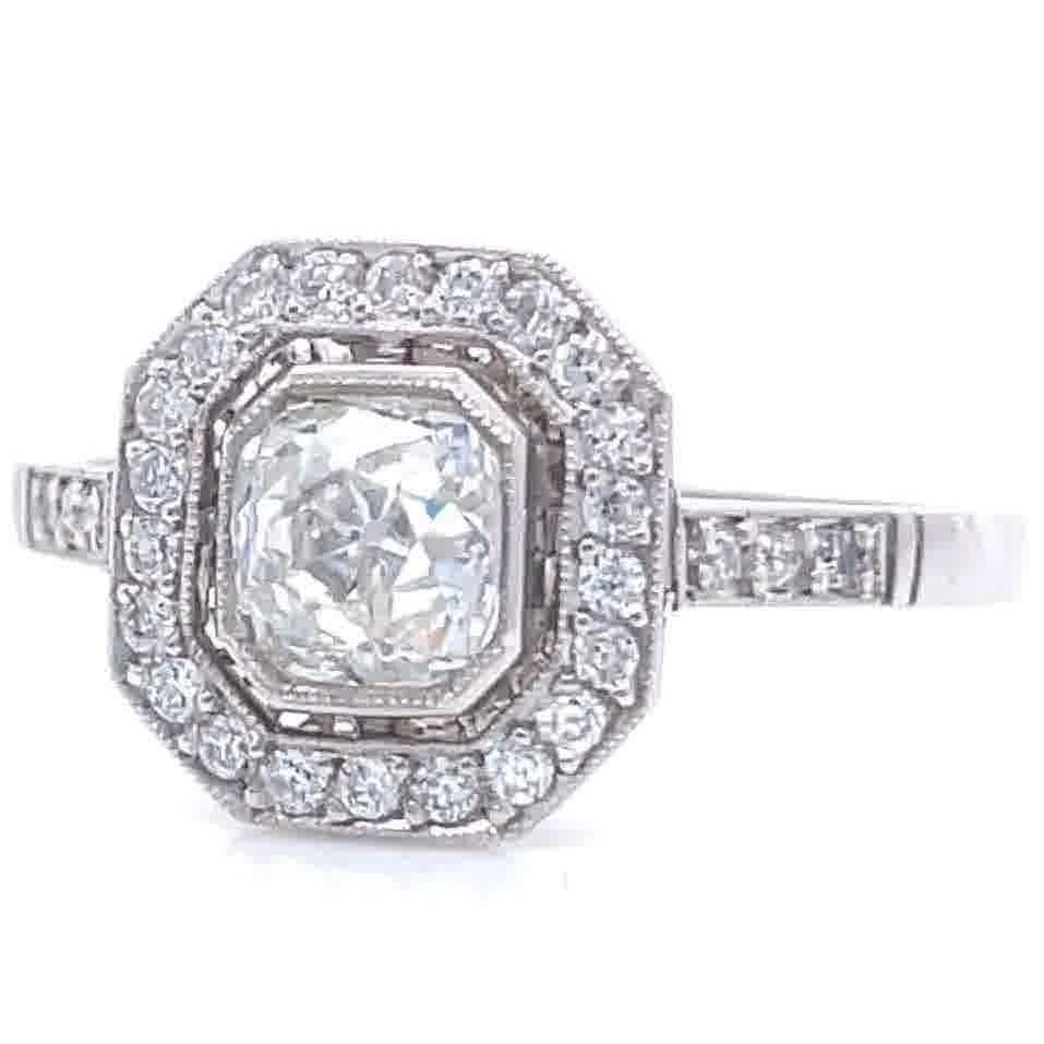 The Art Deco style never gets old! The dancing, the cocktails, the lifestyle, all the things the Roaring 20's are known for. Feel yourself like a 1920's fashionista wearing this gorgeous Art Deco Inspired Diamond Platinum Ring. The center stone is