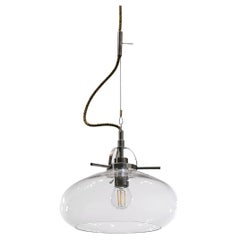 Elegant pendant lamp with glass shade and cotton cable