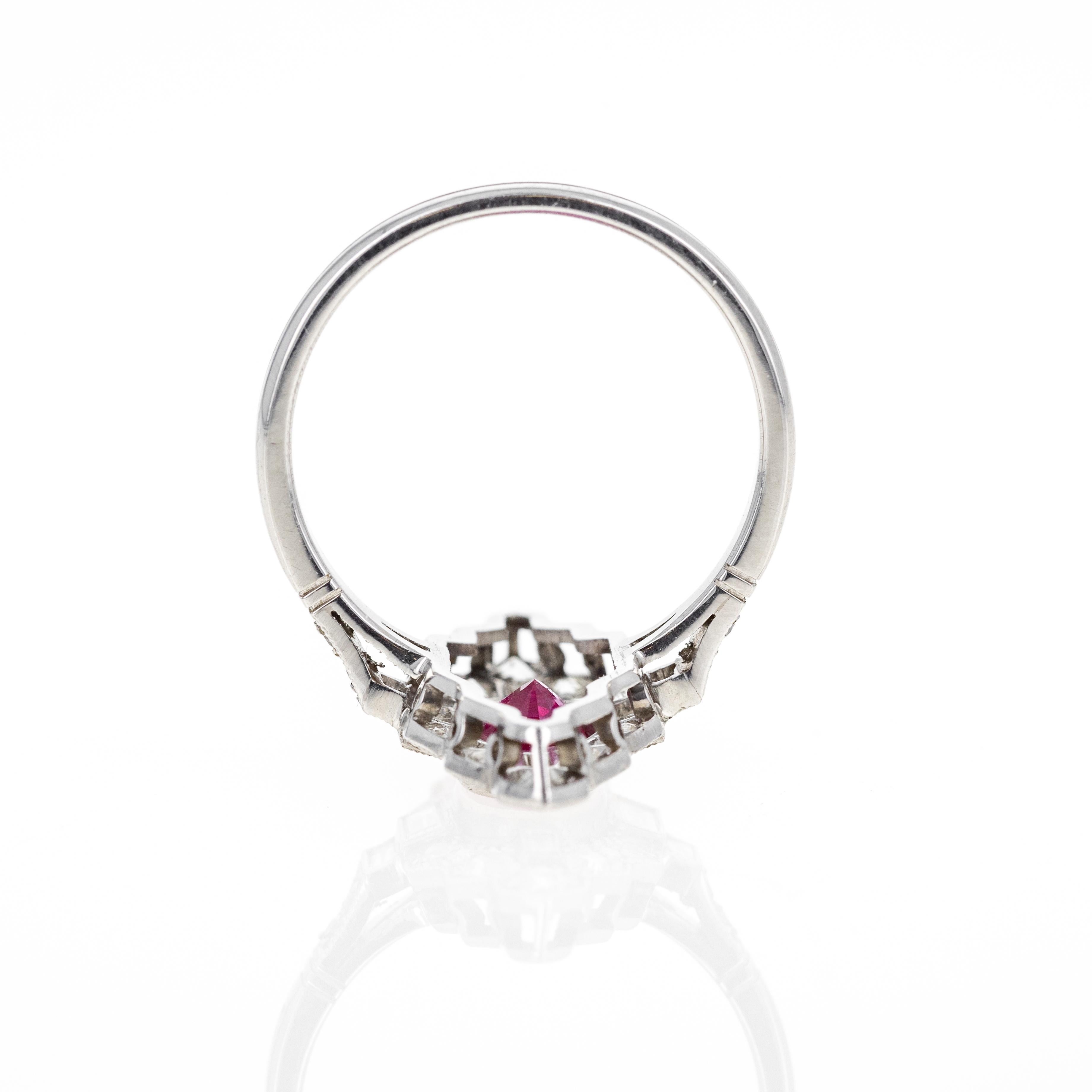 Era: Art Deco Inspired Estate
Composition: Platinum
Primary Stone: Oval Natural Ruby
Carat Weight: 1.22 Carats
GIA Report Number: 2215249676
View The Report
Accent Stone: Six Baguette & Eighteen Old European/Single Cut Diamonds
Carat Weight: 0.60