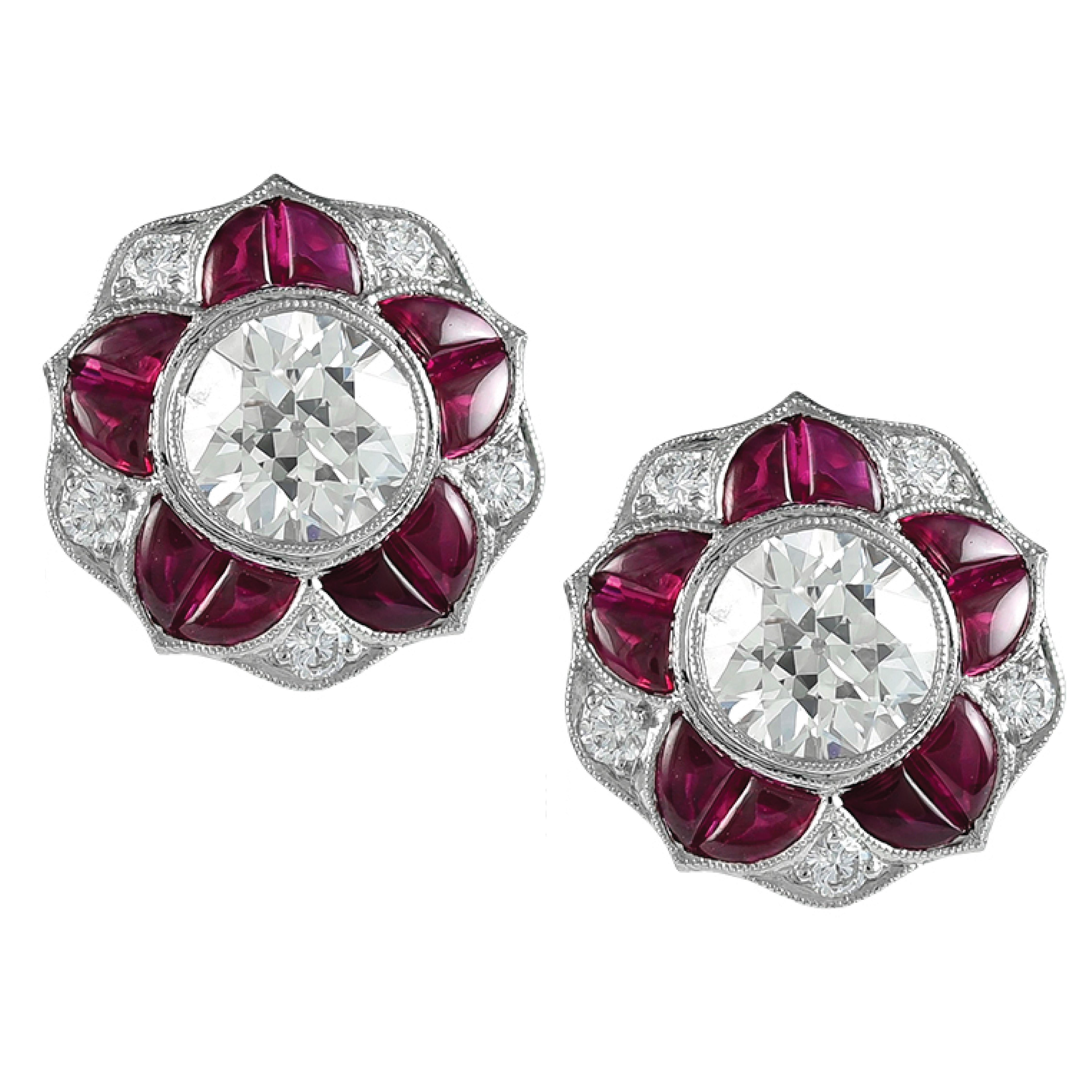 Elegant Platinum Ruby and Diamond Earrings Perfect for Evenings and Daily Use . Cabochon Rubies are Burmese total weight 4.51carats , Two Center O. E. Diamonds 1.66 carats , and Small Surrounding Diamonds 0.40 carats.

Sophia D by Joseph Dardashti