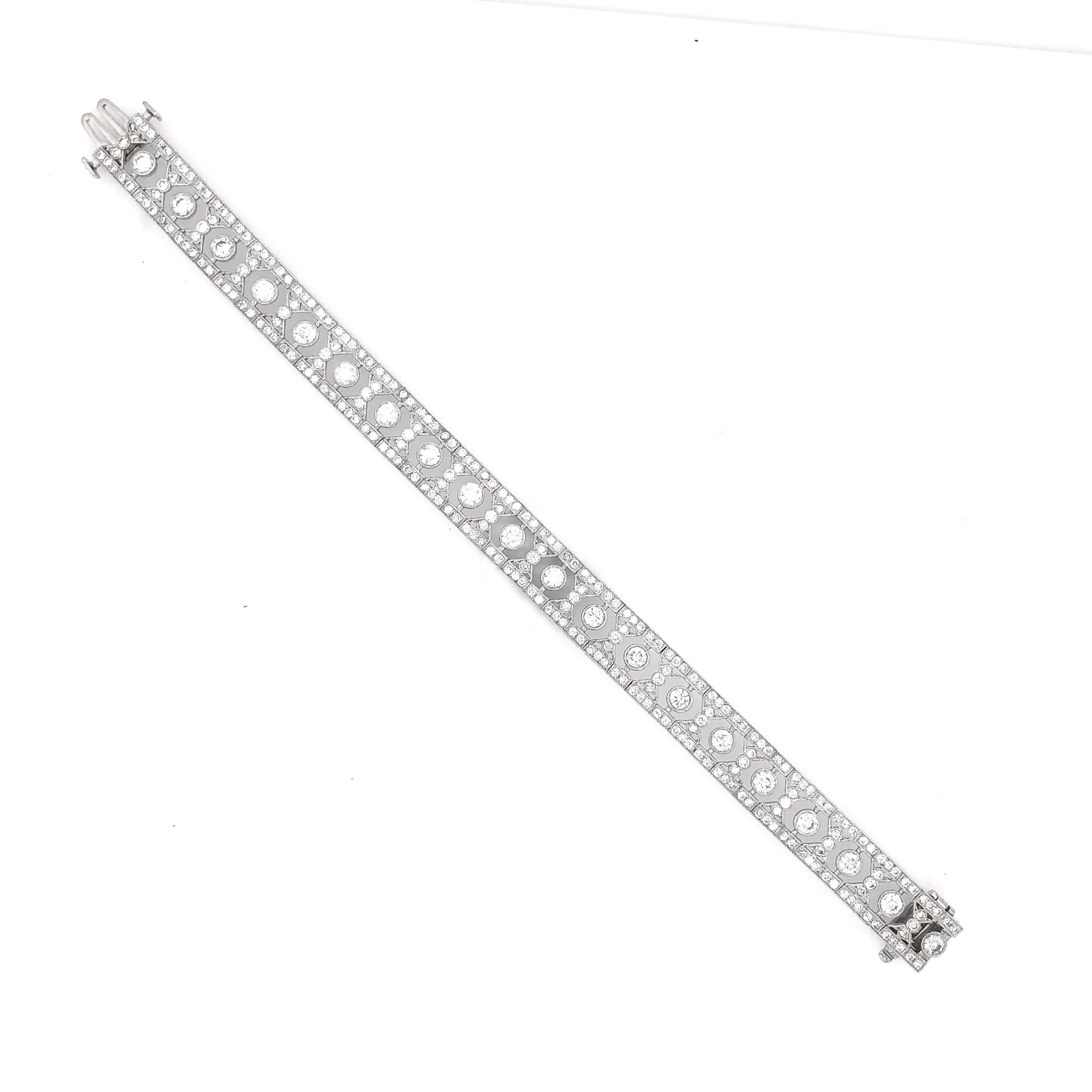 Slim vintage and Art Deco inspired diamond platinum bracelet. 
Adorned with white round cut diamonds in 6.12 carat total.
Diamonds are all natural in G-H Color Clarity VS.   
Platinum 950 bracelet. 
Length: 17.5 cm
Width. 1 cm
Weight: 28.9 g
