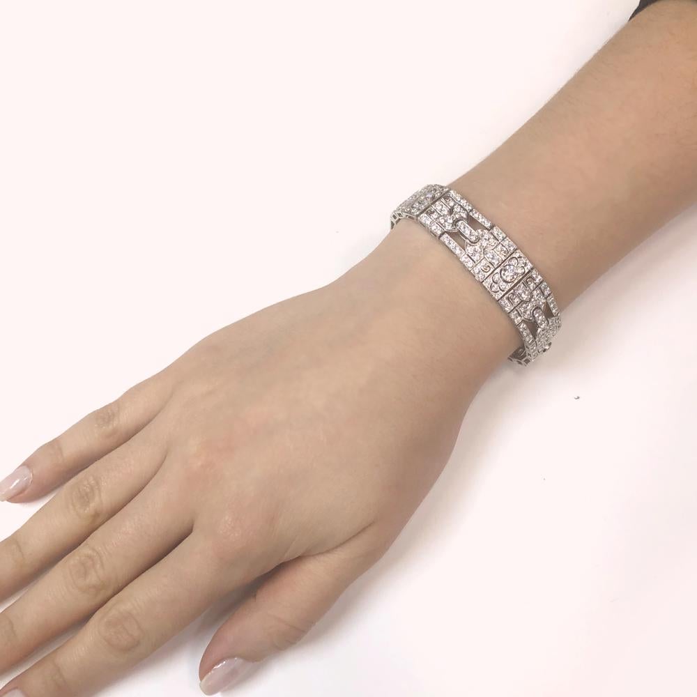 A beautiful Art Deco and retro vintage inspired diamond platinum bracelet. 
Covered in stunning round cut white natural diamonds 11.29 ct in total.
Diamonds get that extra sparkle against the silver brilliance of the platinum 950 metal.
Diamonds are