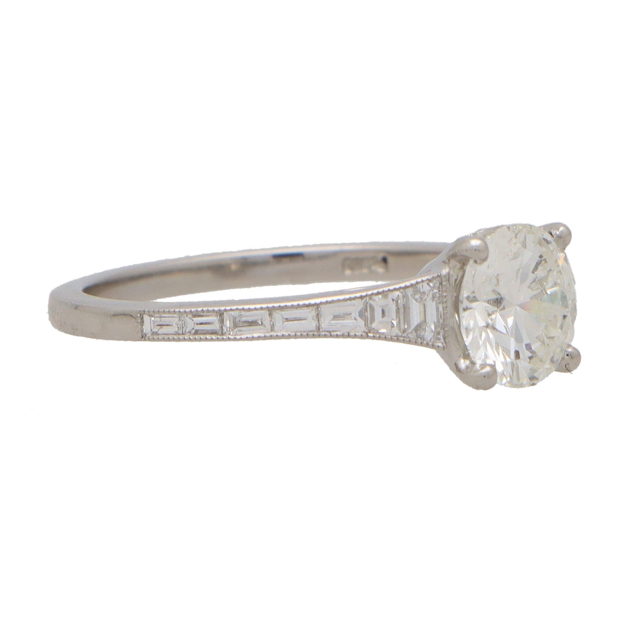 Modern Art Deco Inspired Round Diamond Ring with Baguette Shoulders Set in Platinum For Sale
