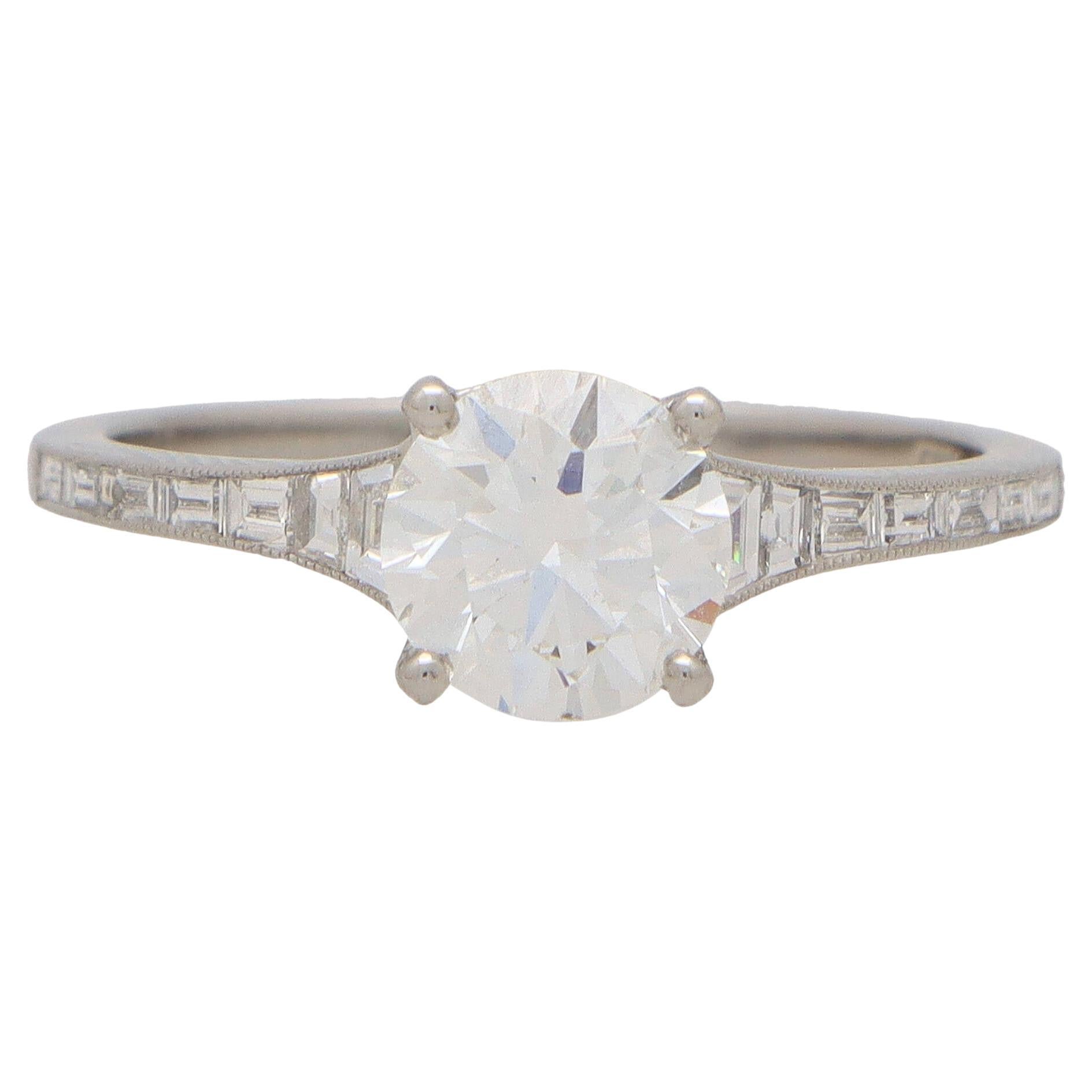 Art Deco Inspired Round Diamond Ring with Baguette Shoulders Set in Platinum For Sale