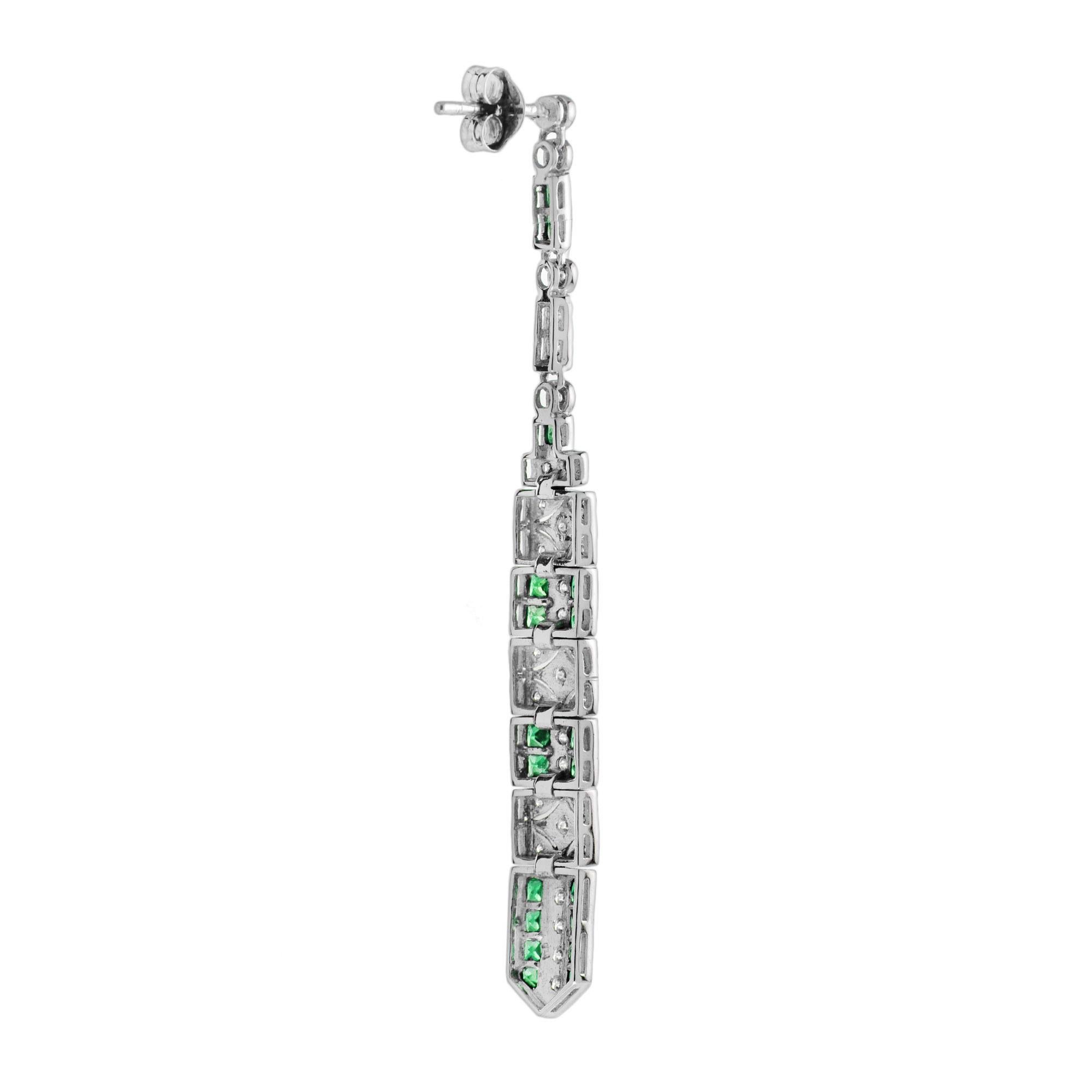 These art deco bar dangle earrings are the epitome of vintage-inspired elegance featuring mesmerizing geometric patterns feature with emerald and diamonds.
Earrings Information
Metal: 14K White Gold
Width: 6 mm.
Length: 62 mm.
Weight: 7.90 g.