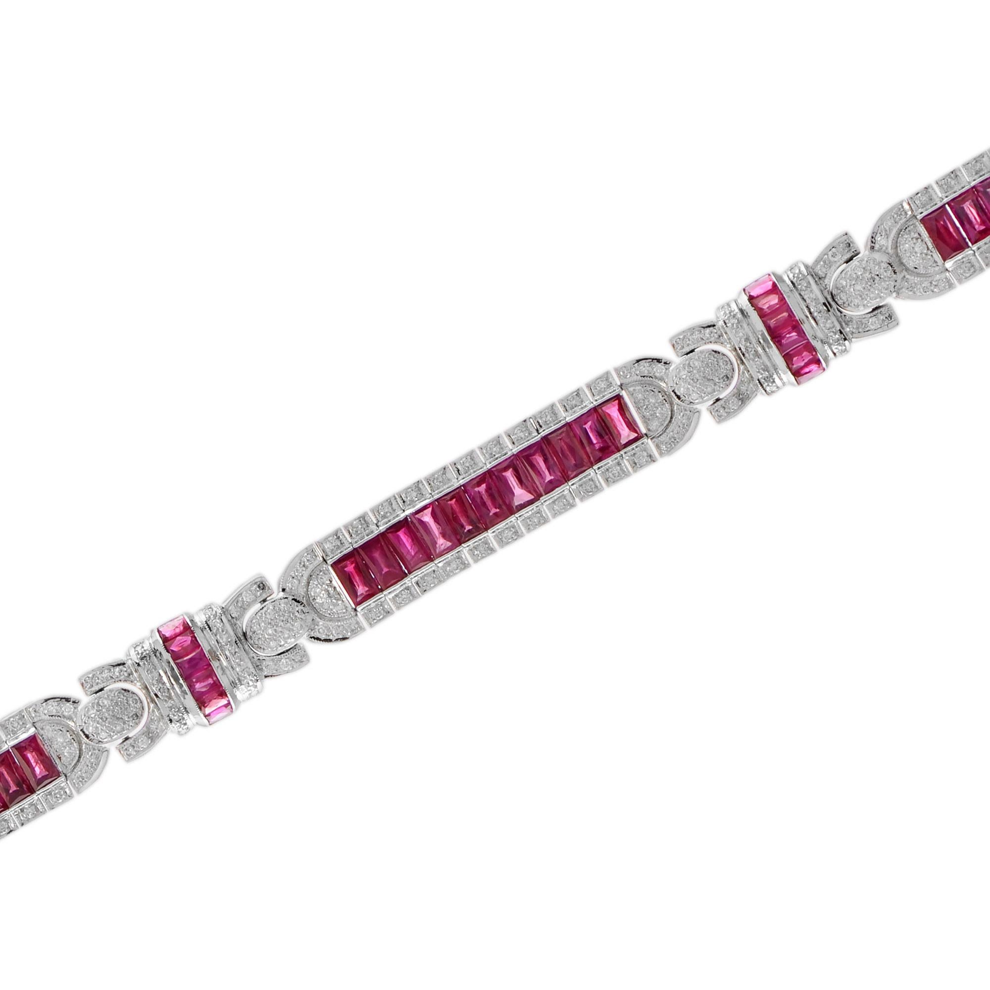 This stunning, fine and impressive antique style ruby bracelet with diamonds is crafted in 18k white gold. The fully articulated bracelet is composed of 9.39 carat rubies and 1.15 carats round brilliant diamonds. This wonderful piece is a must-have