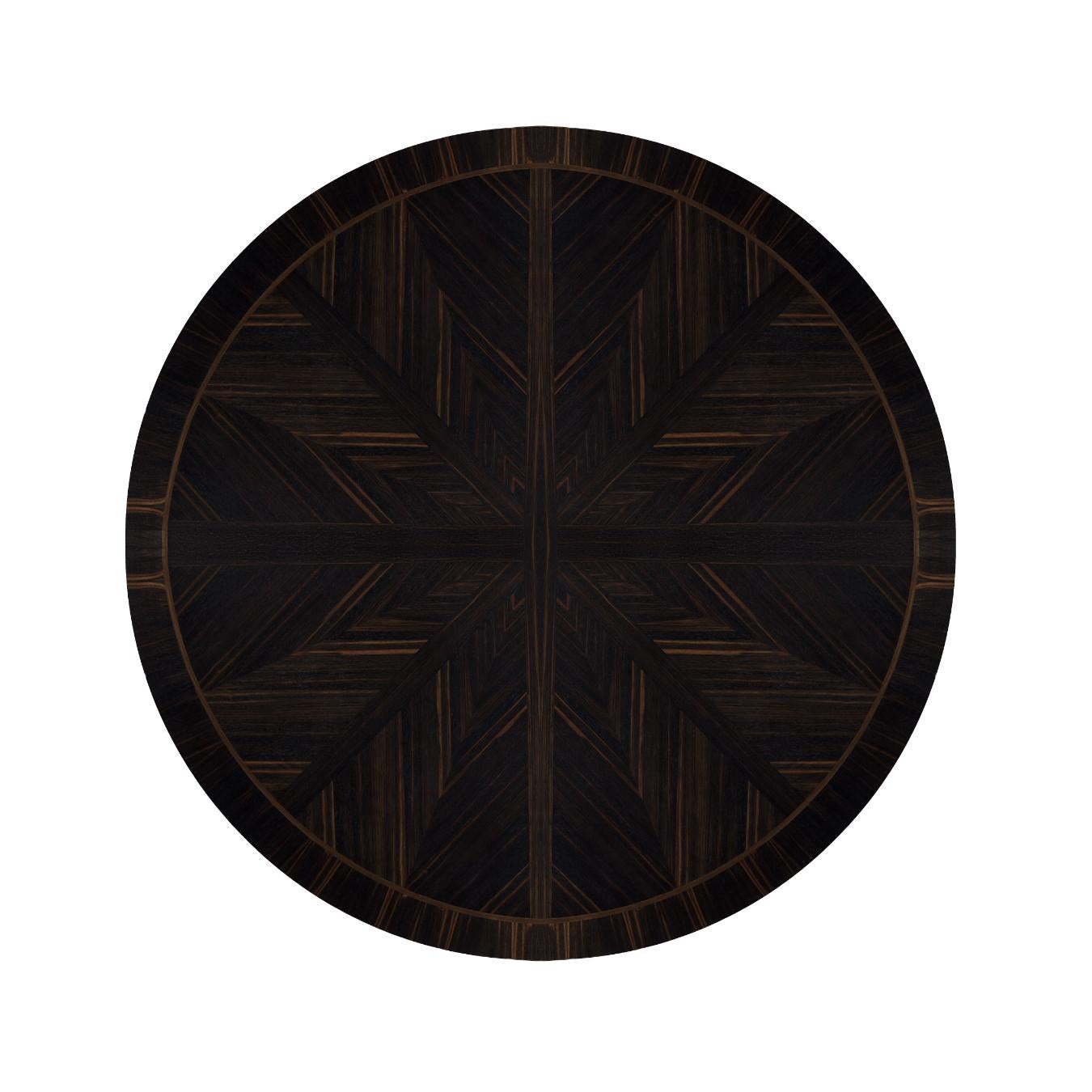 Inspired by the elegance of Art Deco, its base is formed with concave arcs. The tabletop has a unique star design made of ebony veneer. This piece is completed with a waxed finish, which gives it a casual look.
   
