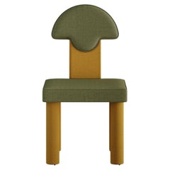 Sedia da pranzo Art Deco Inspo con schienale rotondo imbottito in verde e giallo.