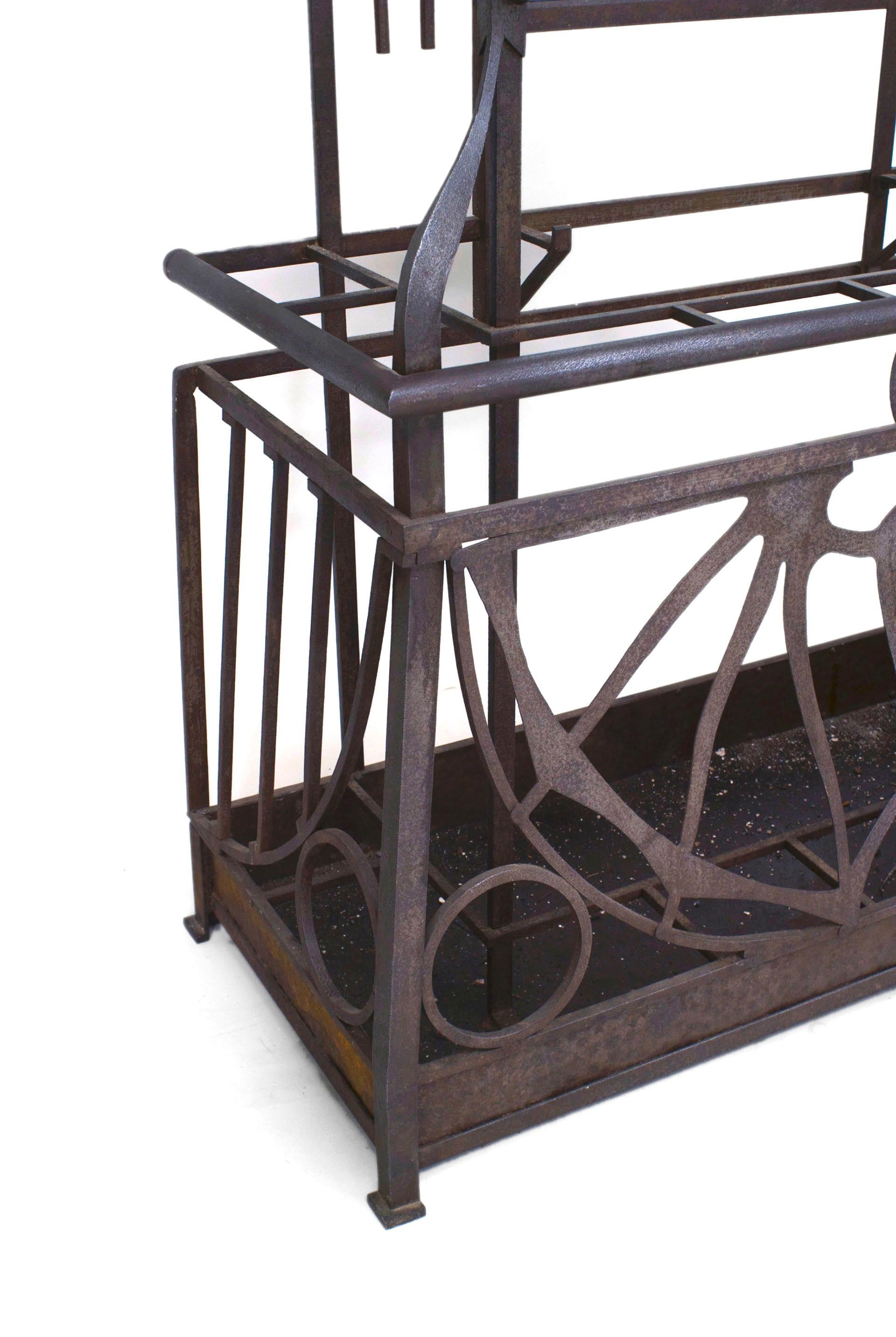 French Art Deco (possibly Austrian) iron hatrack/umbrella stand with a shelf and a filigree 