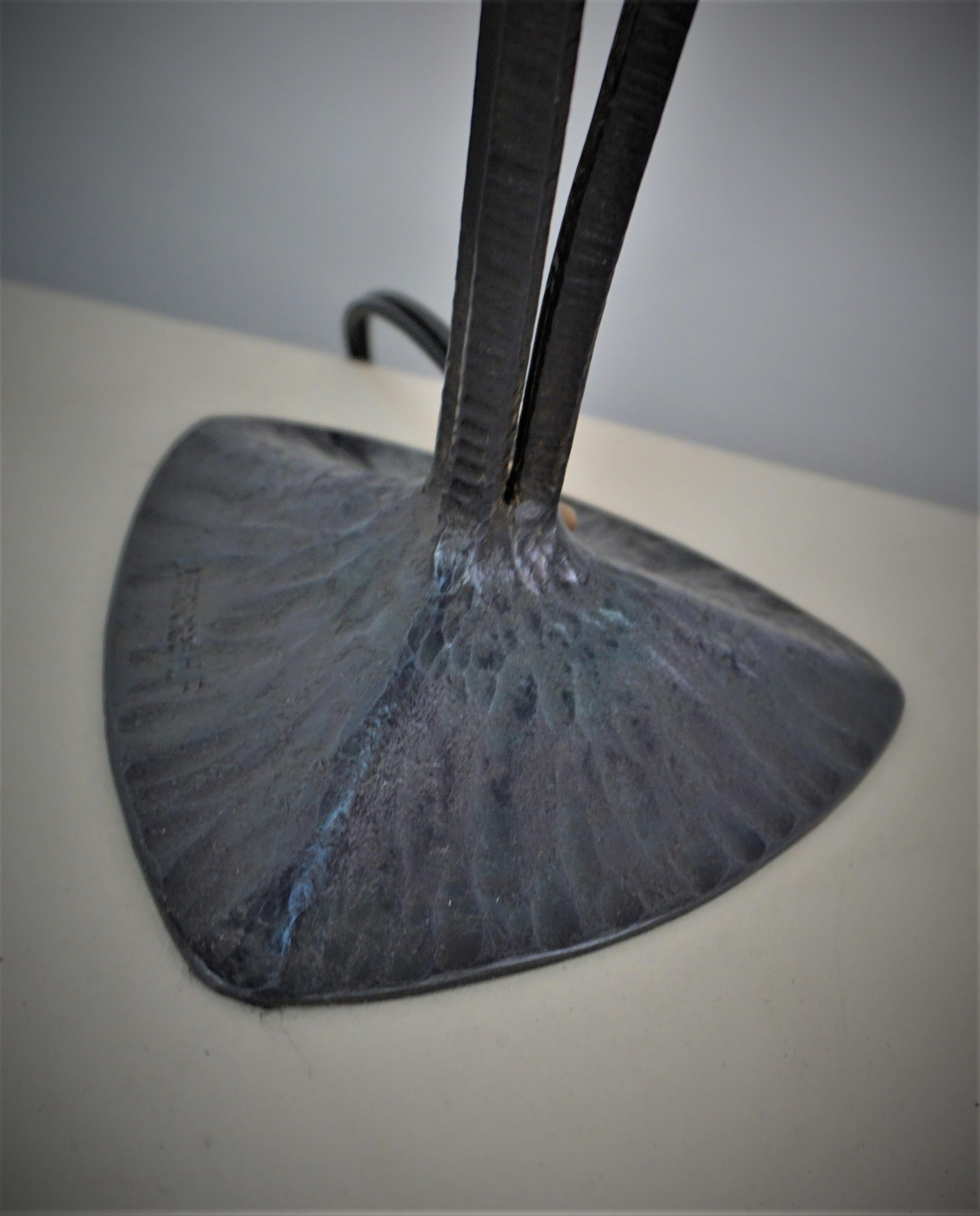Rare 1920's hand forged iron base sign H F with hand blow orange/blue glass shade table lamp 
Professionally rewired .