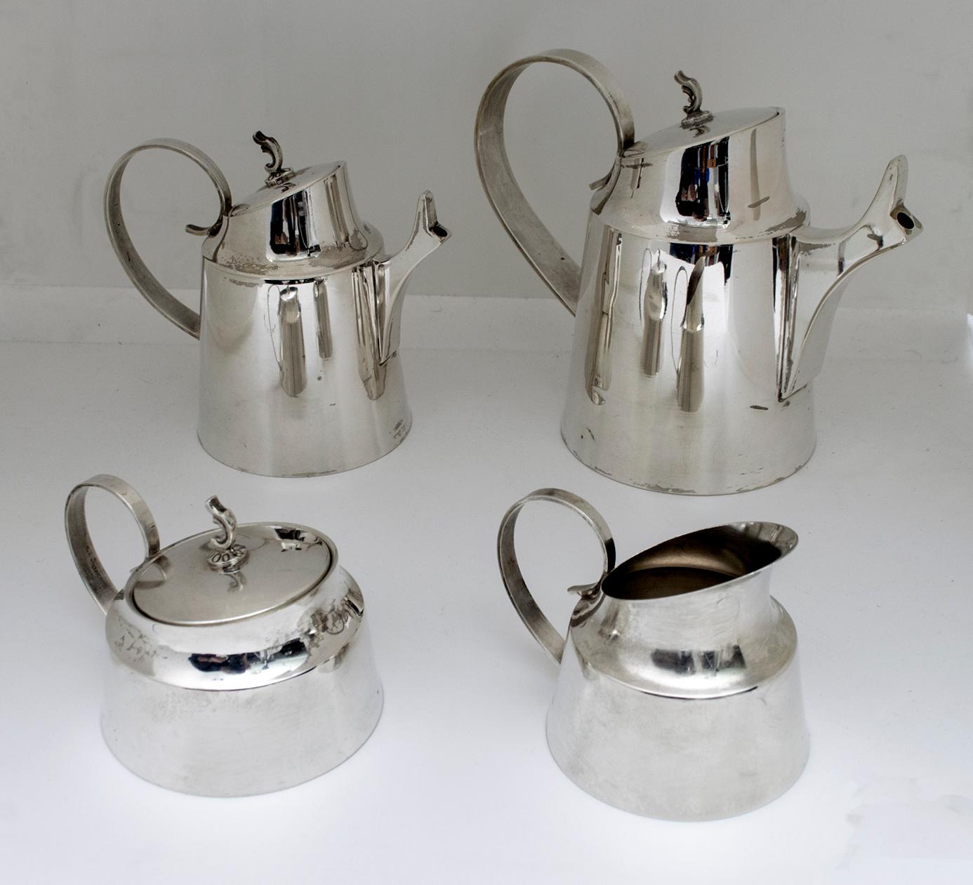 Beautiful 800 silver tea set, consisting of 4 pieces, 1 teapot, 1 coffee pot, 1 sugar bowl and 1 milk jug, the following pieces are marked with an identification stamp that consists of a happy diamond:
The number: corresponding to the