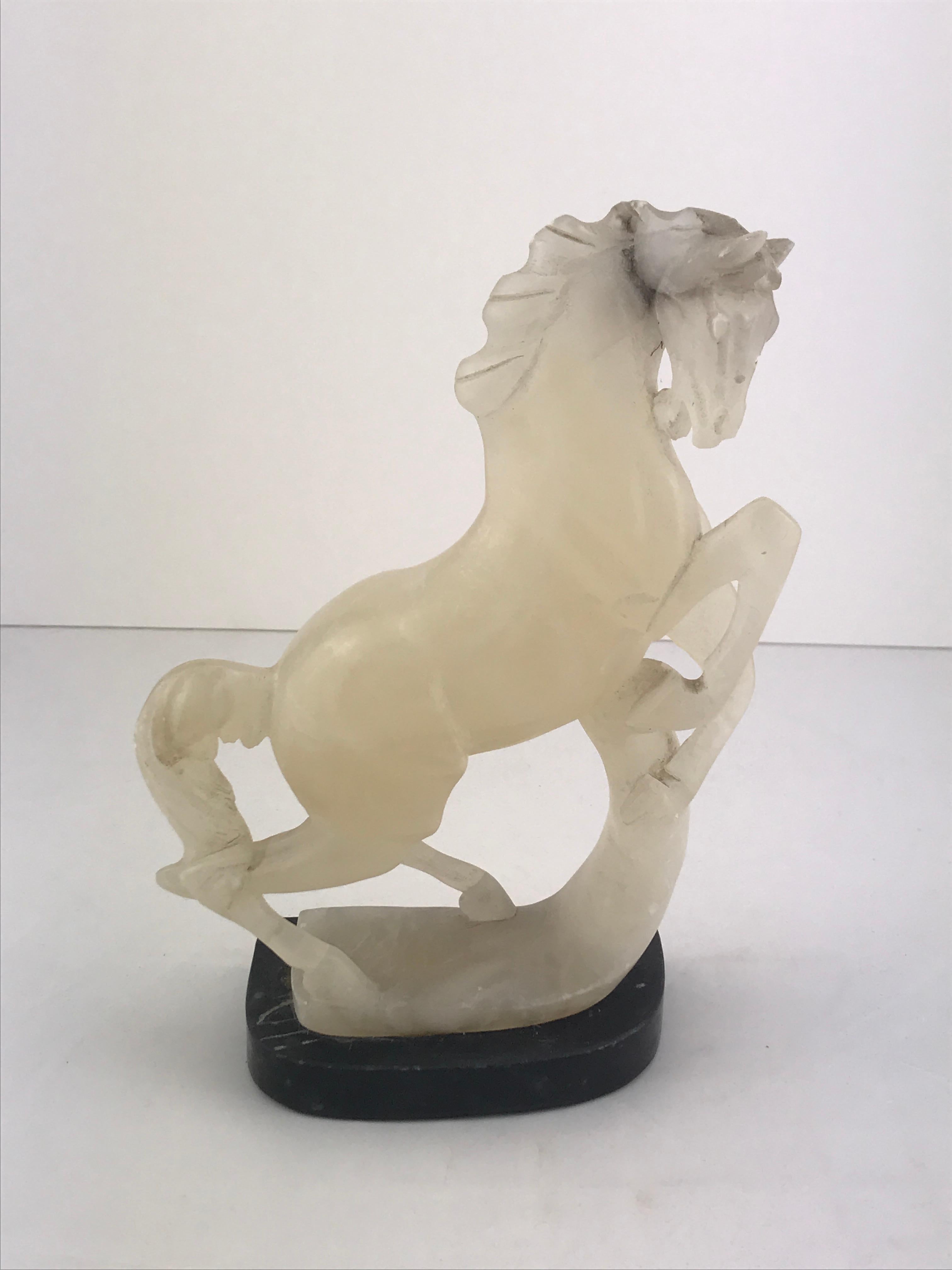 Beautiful Art Deco Italian horse sculpture in black marble base and white alabaster.
 