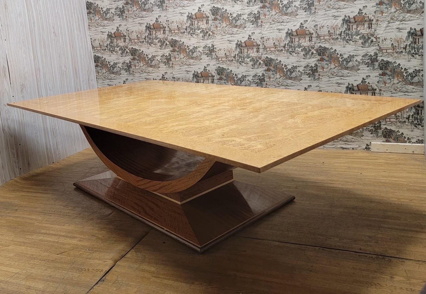 Vintage Art Deco Italian Burled Wood Arched Base Rectangular Dining Table

Absolutely stunning, large 10 chair Italian Biedermeier style dining table featured in Architectural Digest. This table features a burled rectangular deep knife-cut edge top