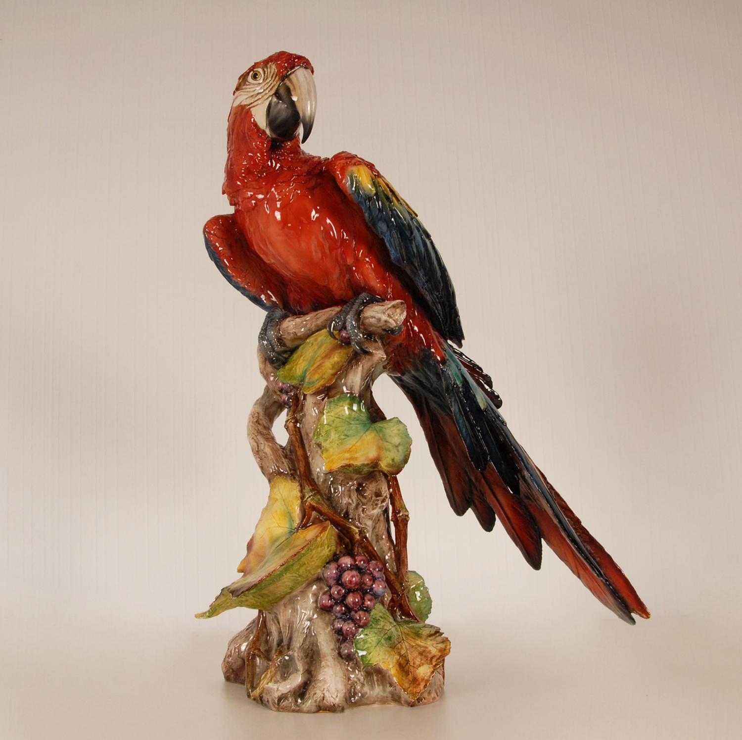 Art Deco tall Italian animal Figurine Ceramic Parrot Macaw on a tree trunk
Material: porcelain, ceramic, tin glazed
Design: Cacciapuoti style
Origin: Italy, first half 20th century
Style: Baroque, Art deco, Antique, Vintage, Mid Century,
