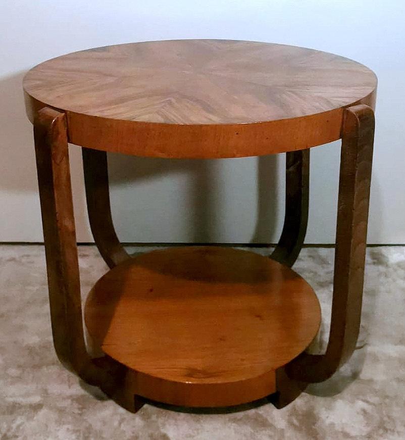 We kindly suggest that you read the entire description, as with it we try to give you detailed technical and historical information to guarantee the authenticity of our objects. 
Refined and elegant Italian Art Deco coffee table in walnut; it has an