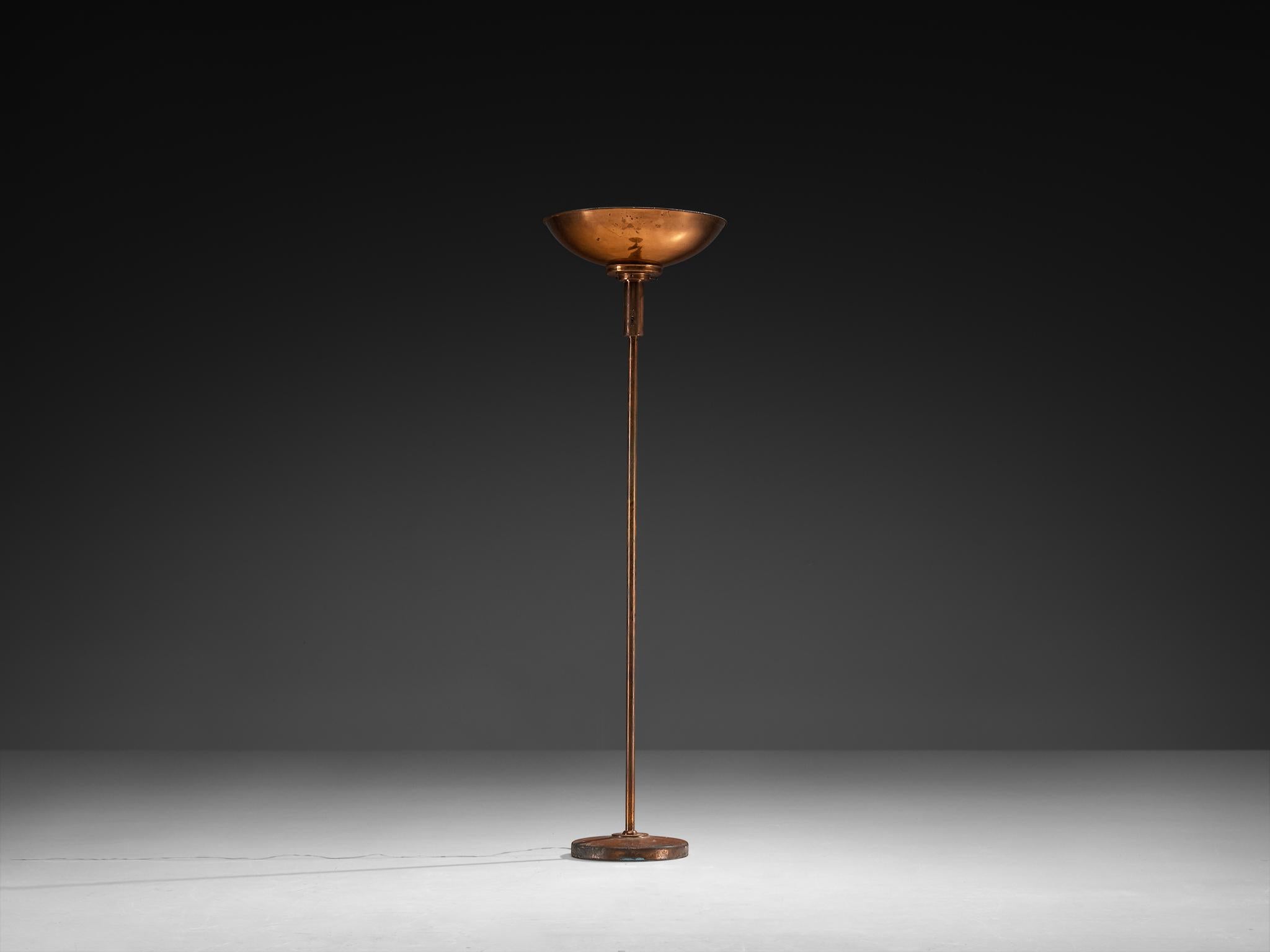 Floor lamp, copper, Italy, 1930s

This striking floor lamp was made in Italy in the 1930s. Crafted entirely from copper, it features a tall, slender silhouette with a wide bowl-shaped shade. The design shows clear Art Deco influences, with its