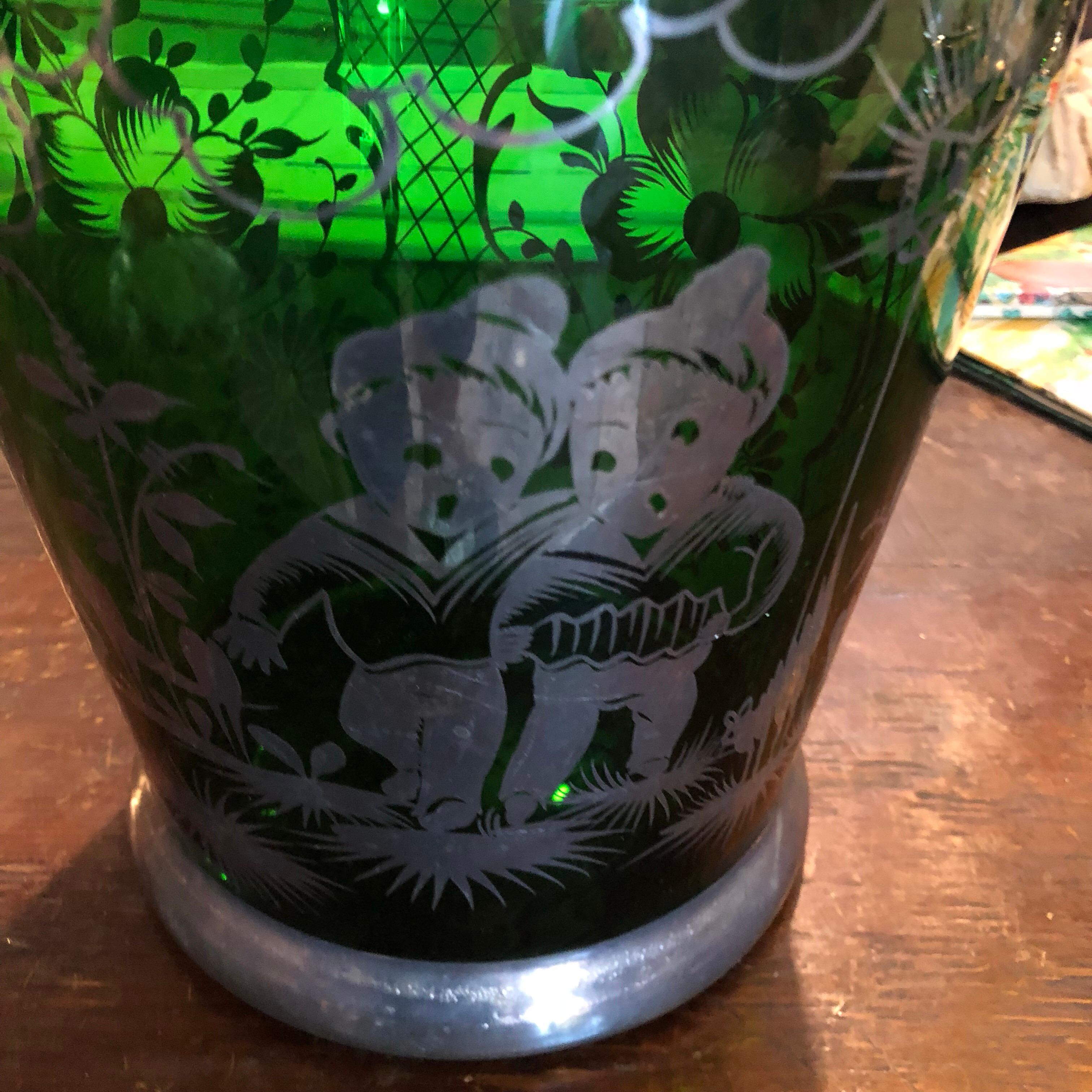 Particular green glass wine cooler, decorations on the glass are in sterling silver, handles and upper edge are in silver plate good conditions overall.