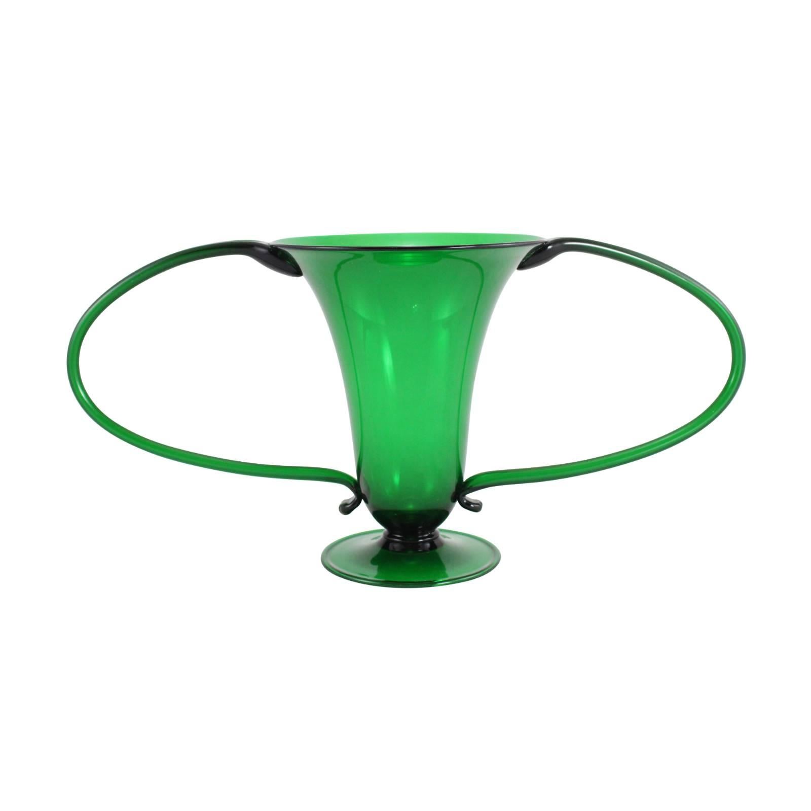 Italian art glass designed by Vittorio Zecchin and produced by Venini in Venice in the 1920s. This piece was inspired by the dragonfly and crafted from very thin blown green glass.