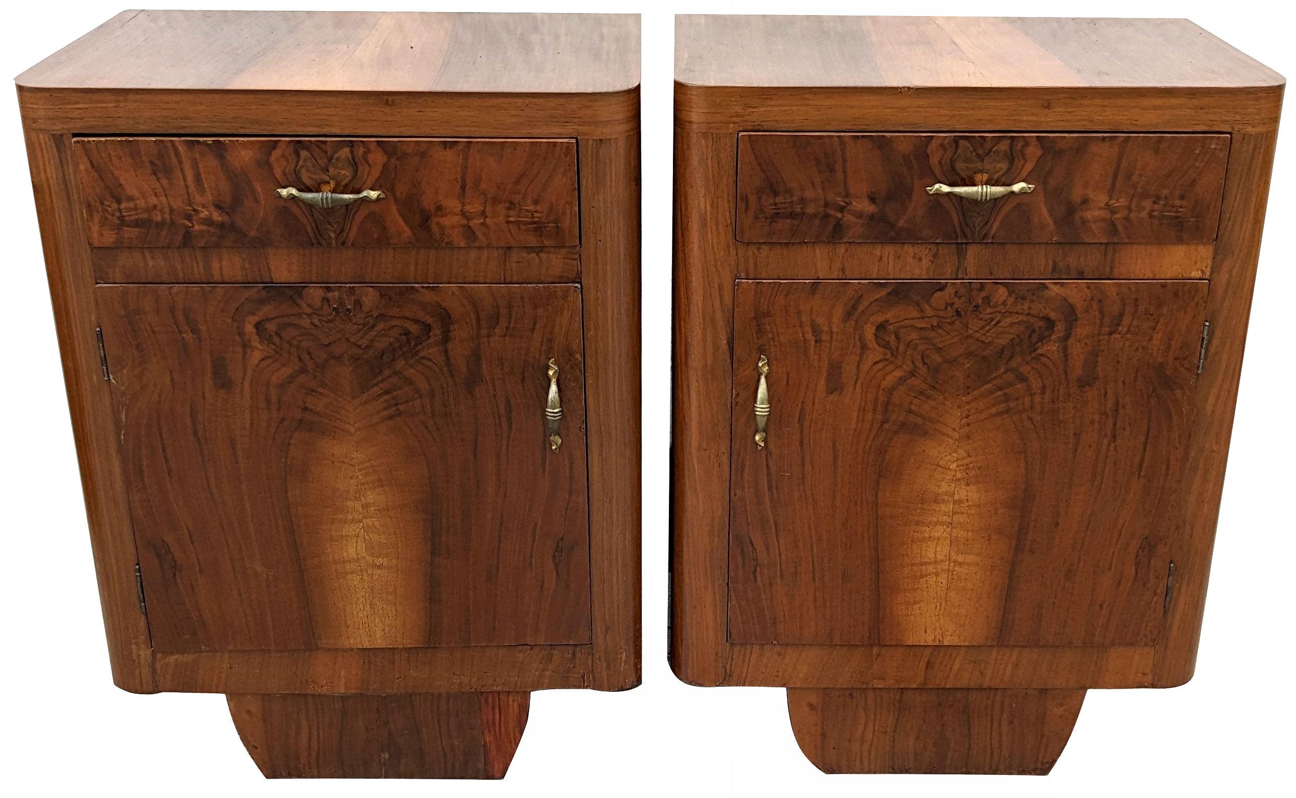 A rare opportunity to acquire beautifully styled and totally original Art Deco bedside tables. Originating from Italy and dating to the early 1930's they fill both the highly desired shape of Art Deco and sort after the luscious veneers of figured