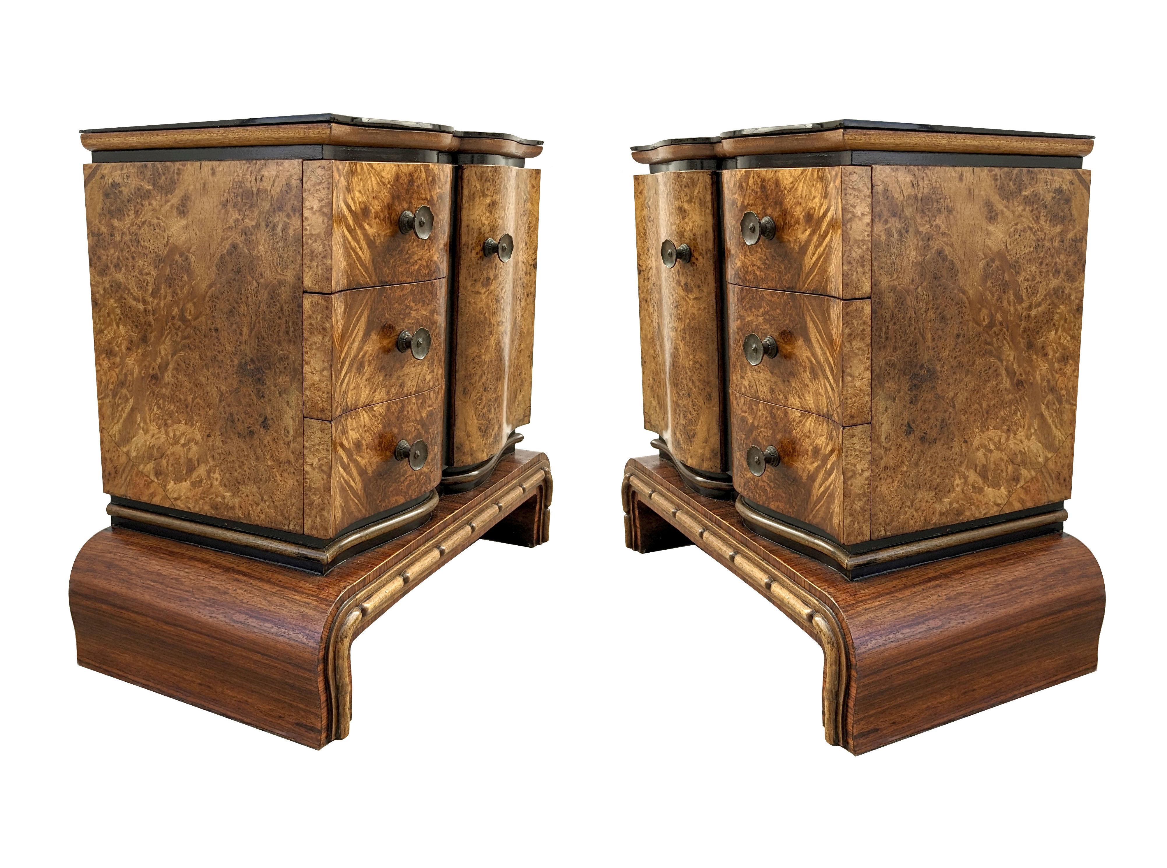 A rare opportunity to acquire such high styled and totally original Art Deco bedside tables. Originating from Italy and dating to the early 1930's they fill both the highly desired shape of Art Deco at its best and sort after the luscious veneers