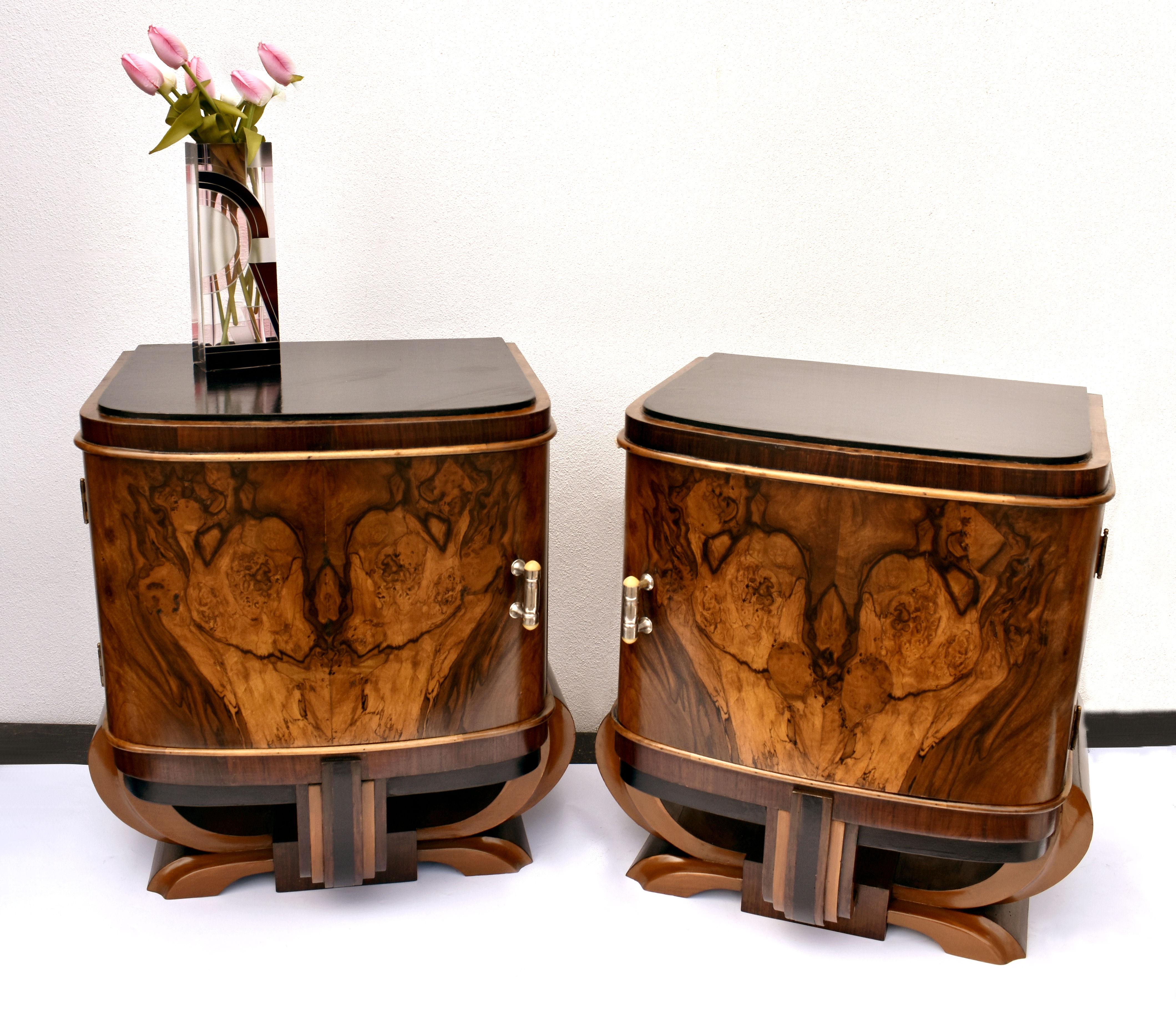 A rare opportunity to acquire such high styled and totally original Art Deco bedside tables. Originating from Italy and dating to the early 1930s they fill both the highly desired shape of Art Deco at its best and sort after the luscious veneers