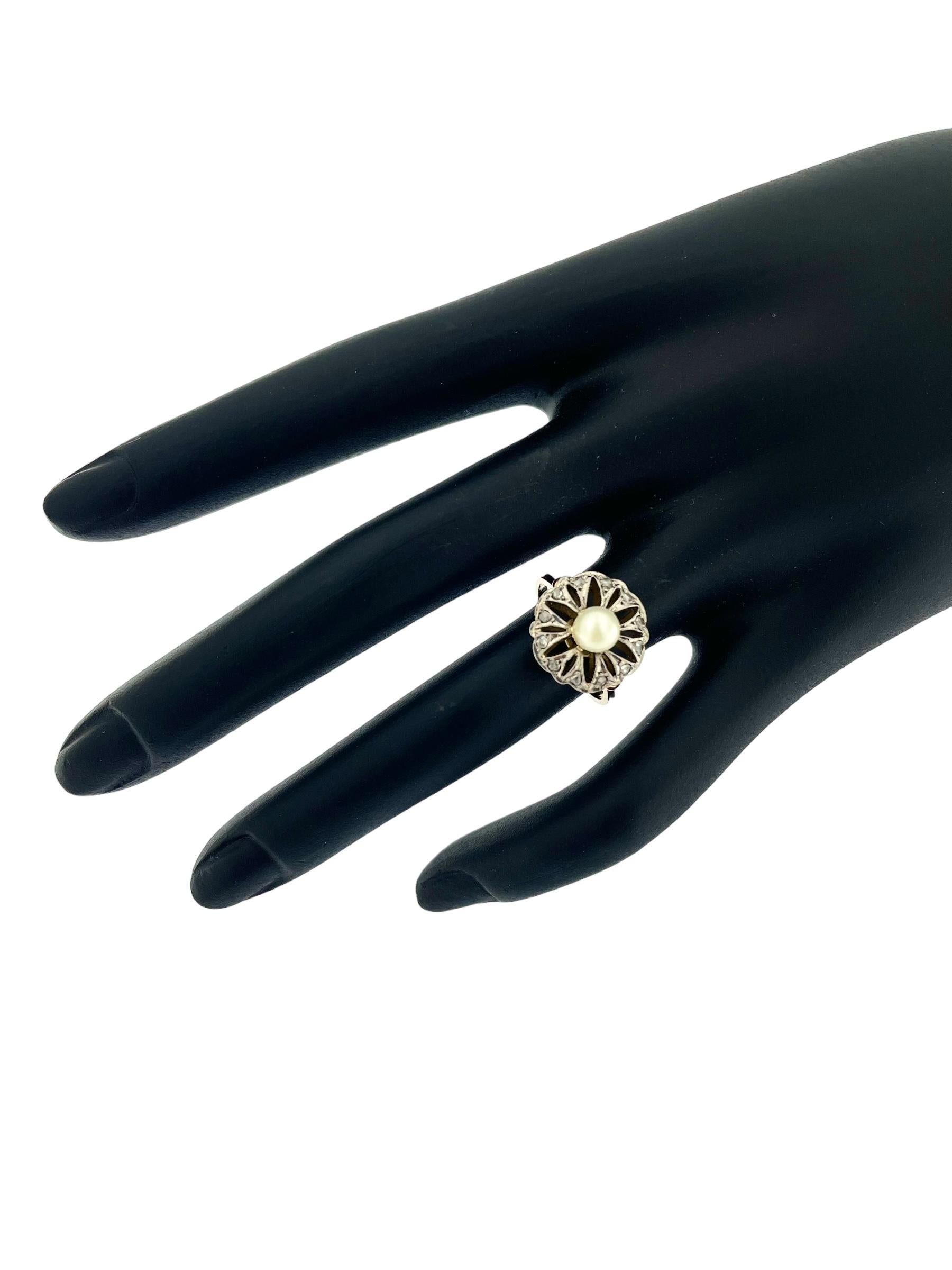 This Art Deco Italian Ring from the 1920s is a stunning example of the opulence and geometric elegance characteristic of the Art Deco era. The ring is crafted with a combination of platinum and 18-karat gold, blending luxury and timeless