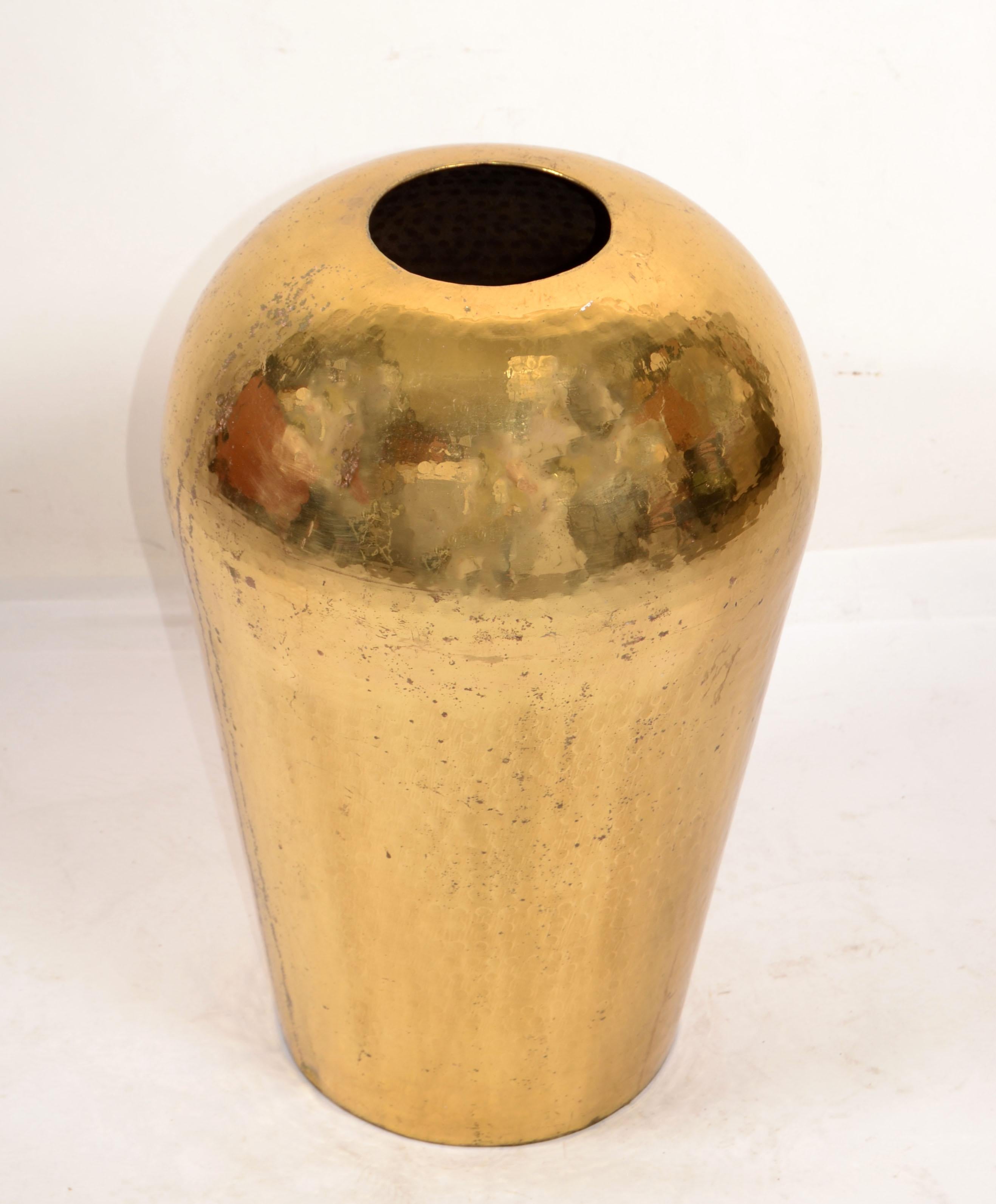 Art Deco Italian Style Large Urn Cone Shape Hand-Hammered Brass Vase Vessel 1970.
Great quality craftsmanship with lots of patina due to History and use. 
Perfect for Mid-Century Modern and any interior Design Styles.
Measures:
Diameter: 12 inches x